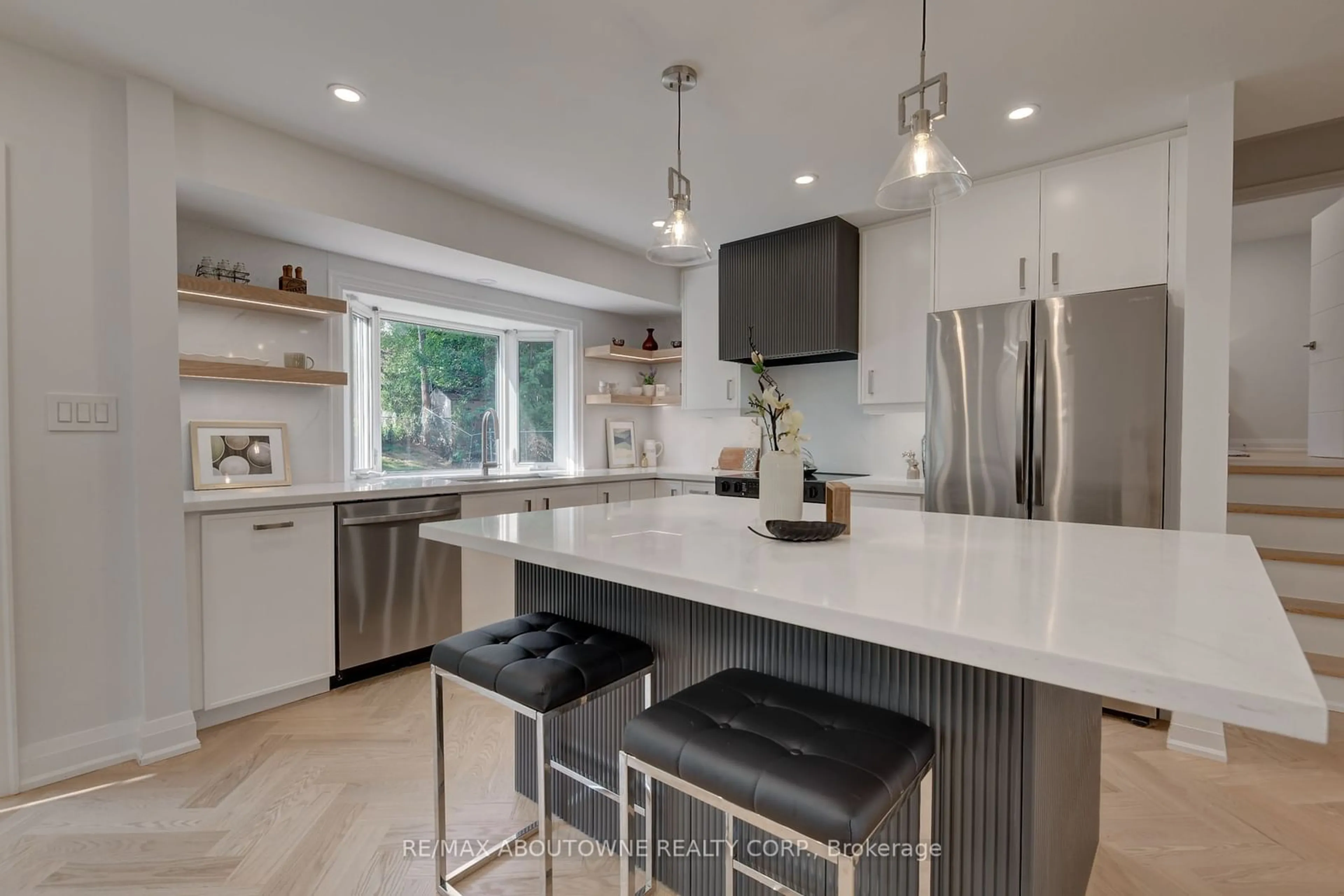 Contemporary kitchen, wood floors for 2435 Cyprus Ave, Burlington Ontario L7P 1G5