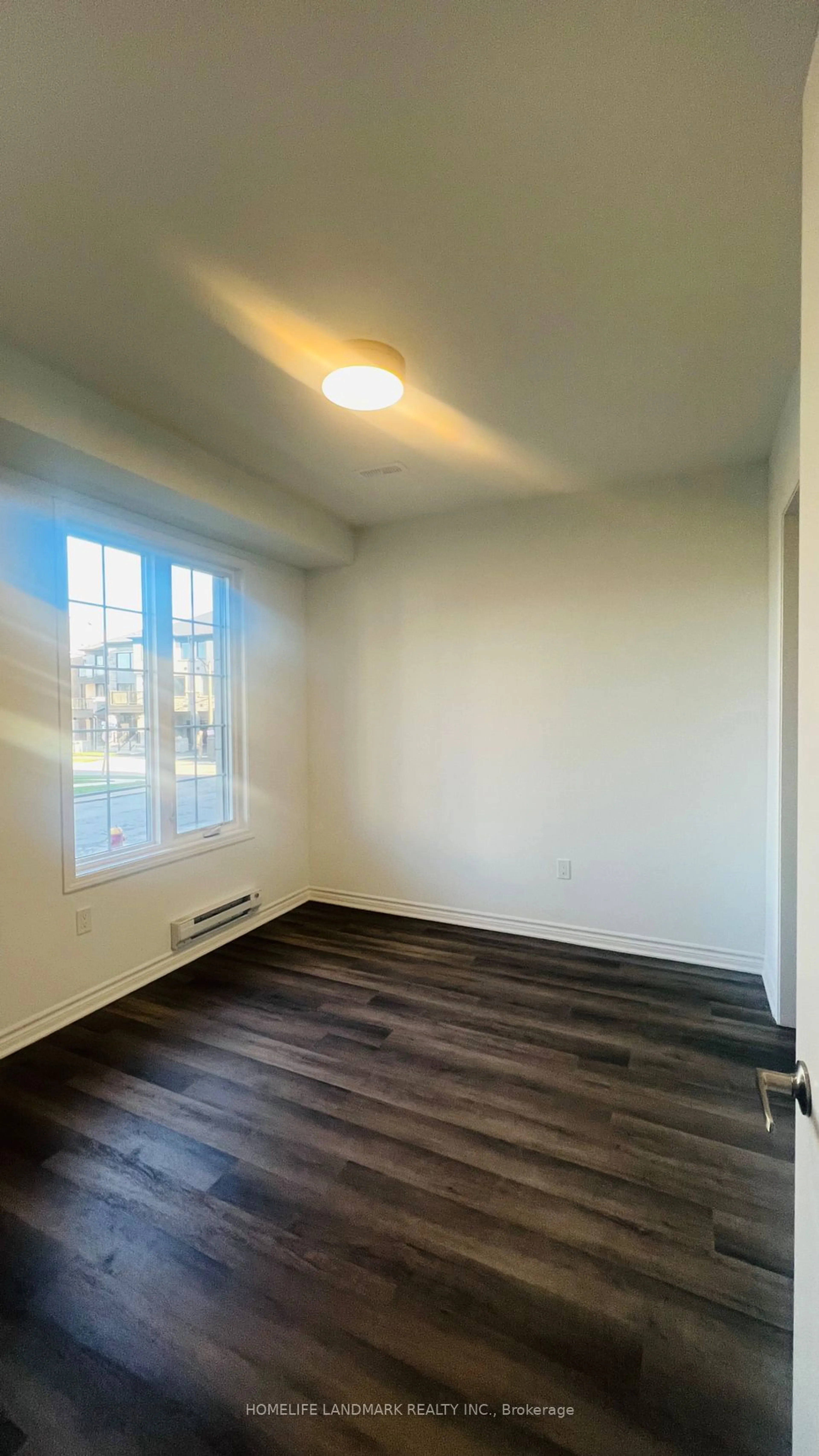 A pic of a room, wood floors for 3070 Merrick Rd, Oakville Ontario L6H 7G1