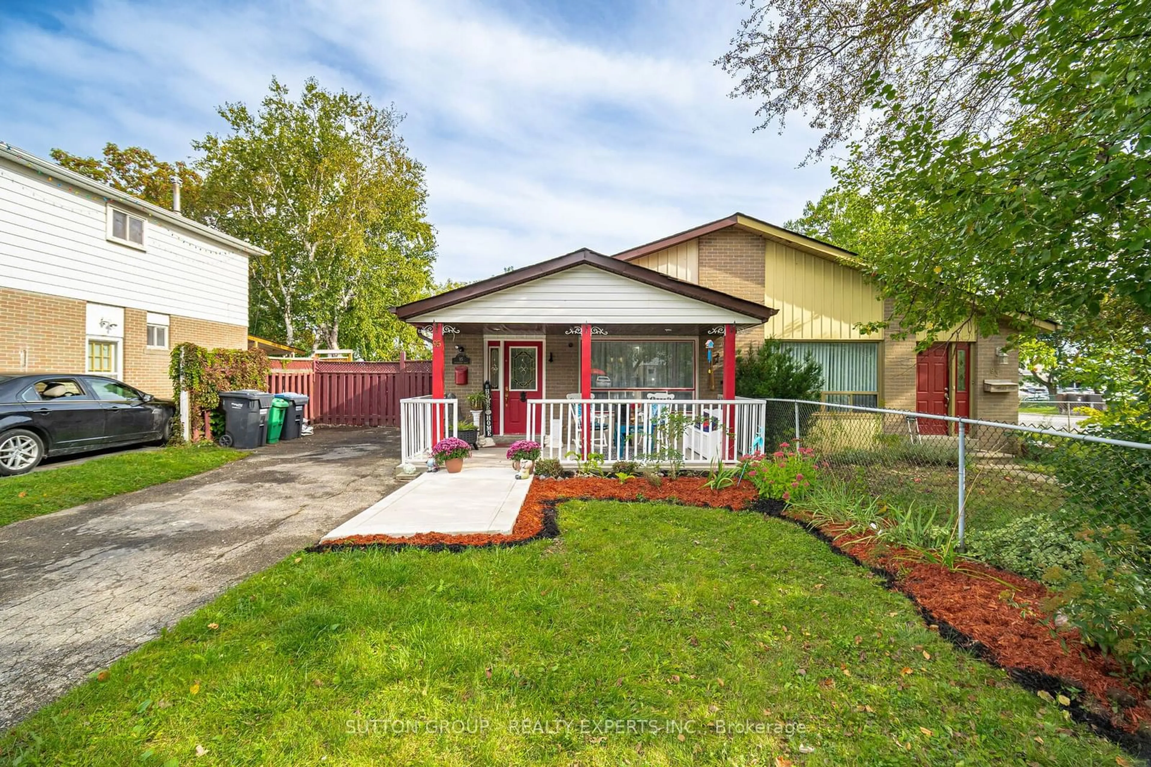 Frontside or backside of a home, the fenced backyard for 95 Archdekin Dr, Brampton Ontario L6V 1Y8