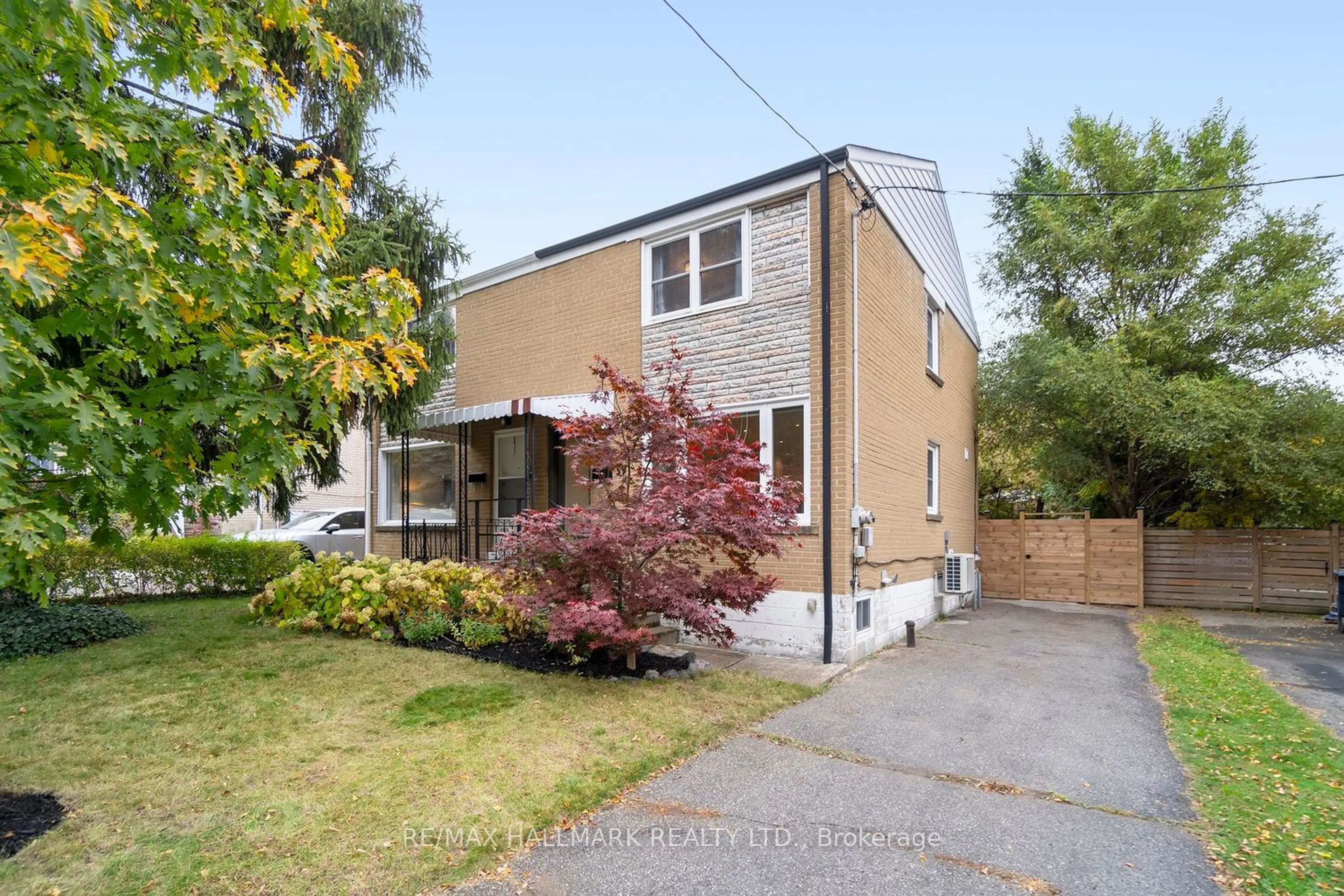 A pic from exterior of the house or condo, the fenced backyard for 59 Skylark Rd, Toronto Ontario M6S 4M5