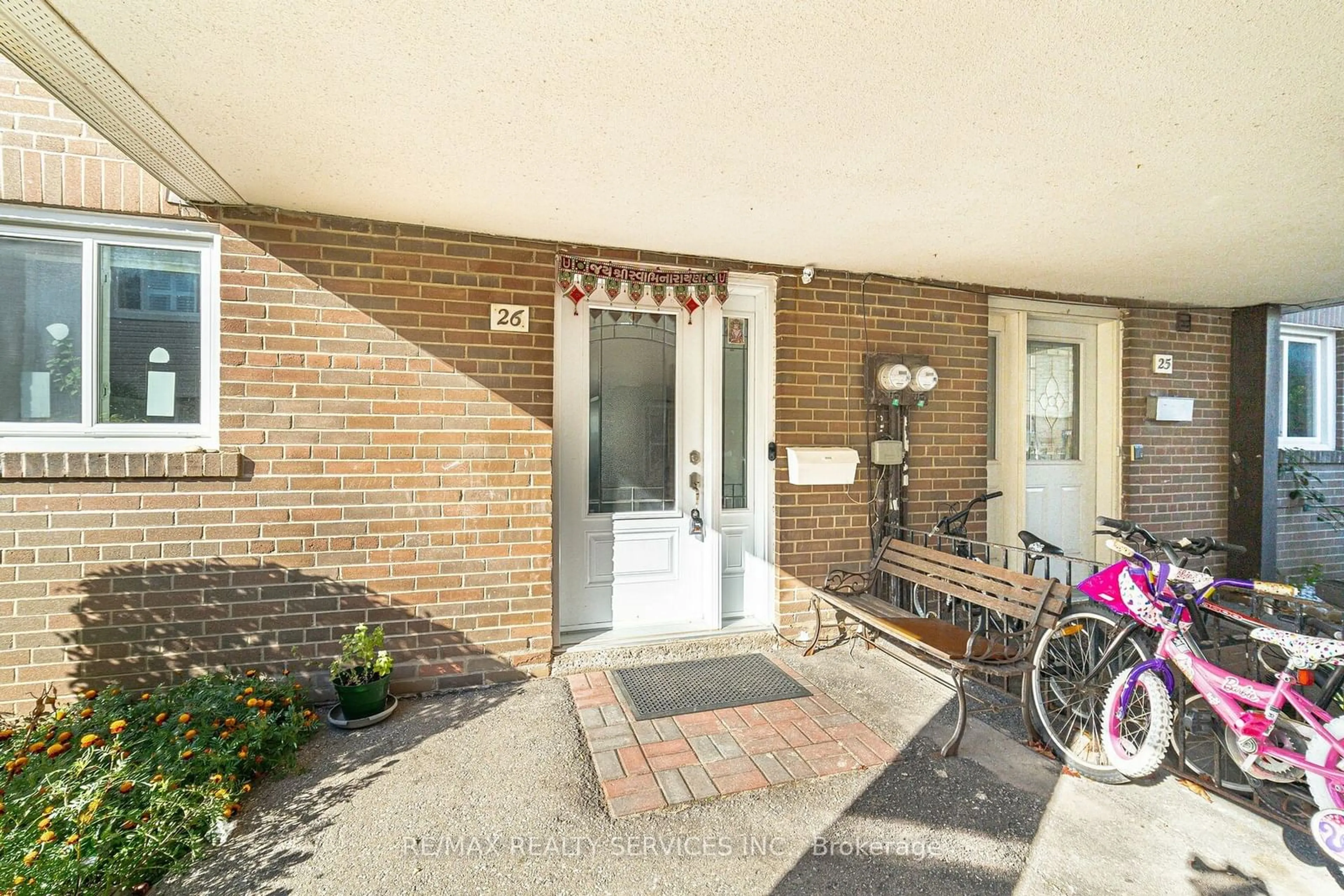 A pic from exterior of the house or condo, the street view for 435 Silverstone Dr #26, Toronto Ontario M9V 3K7