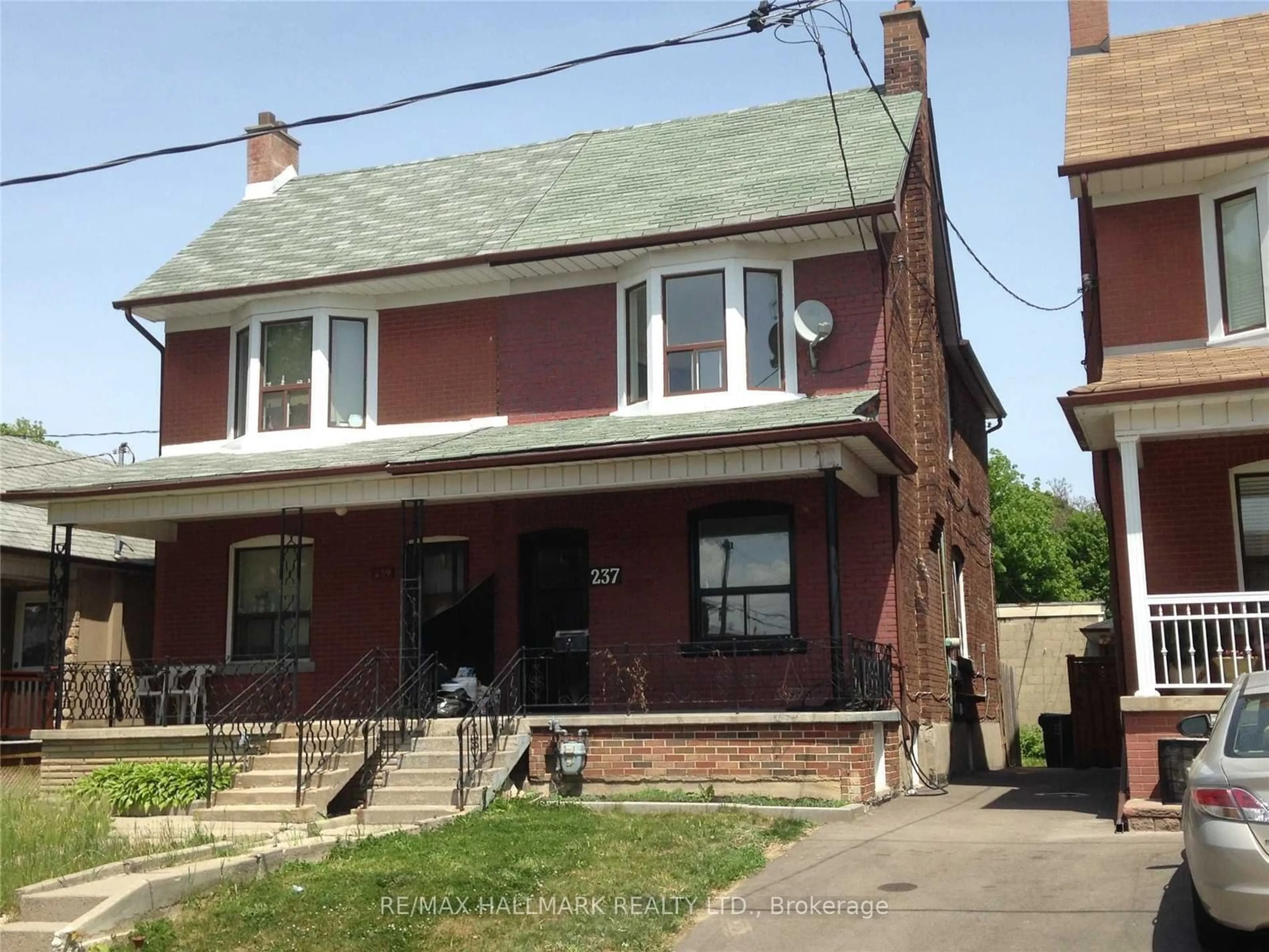 Frontside or backside of a home, the street view for 237 Mcroberts Ave, Toronto Ontario M6E 4P3