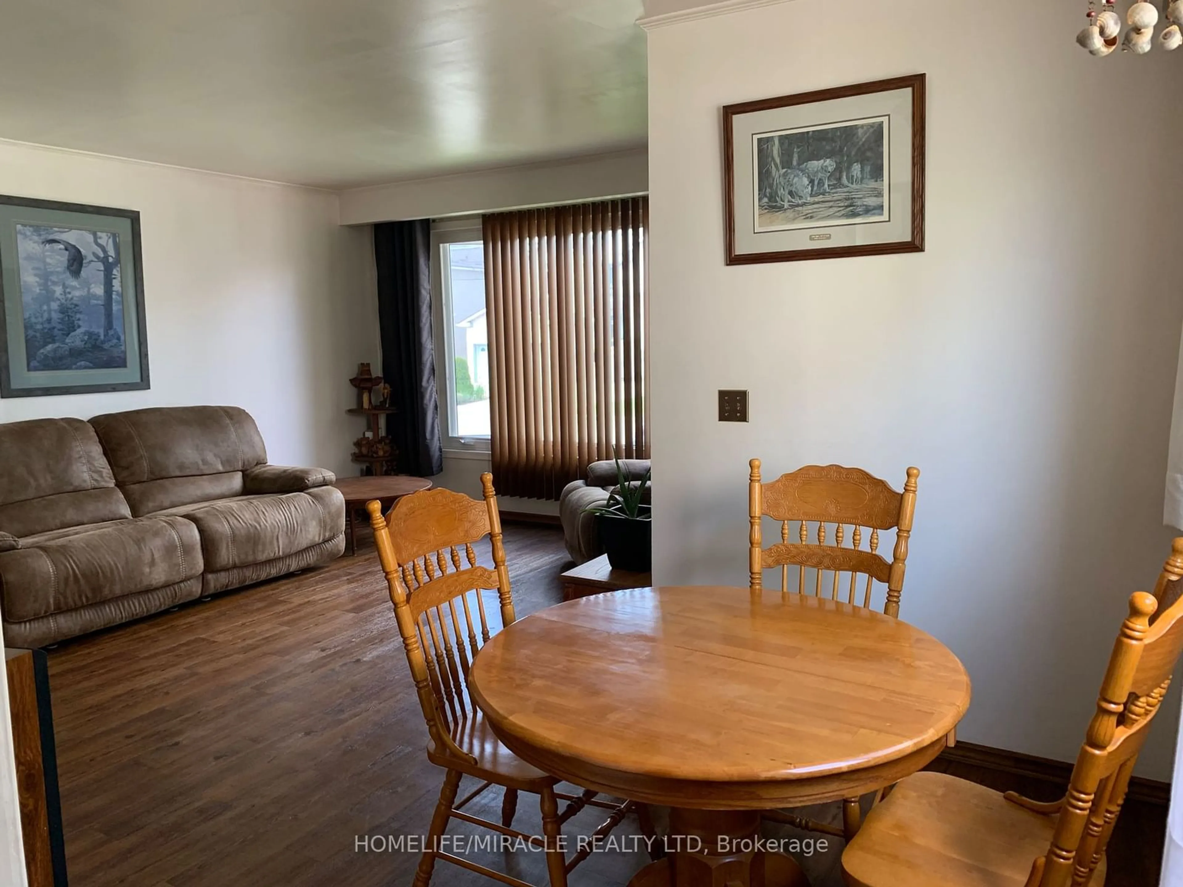 A pic of a room, wood floors for 19 Dee Ave, Toronto Ontario M9N 1S8