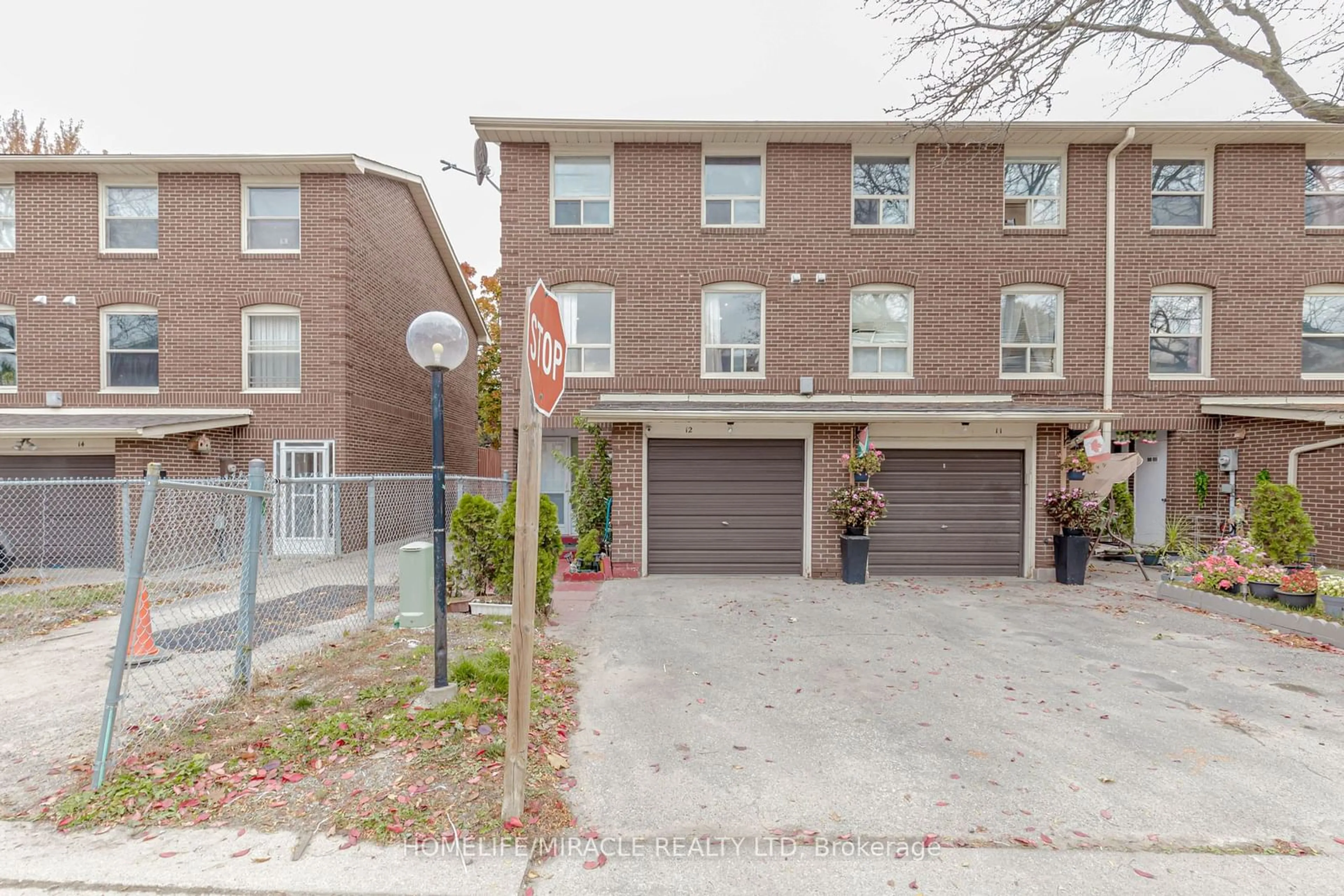 A pic from exterior of the house or condo, the street view for 12 Eden Park #12, Brampton Ontario L6T 3A5