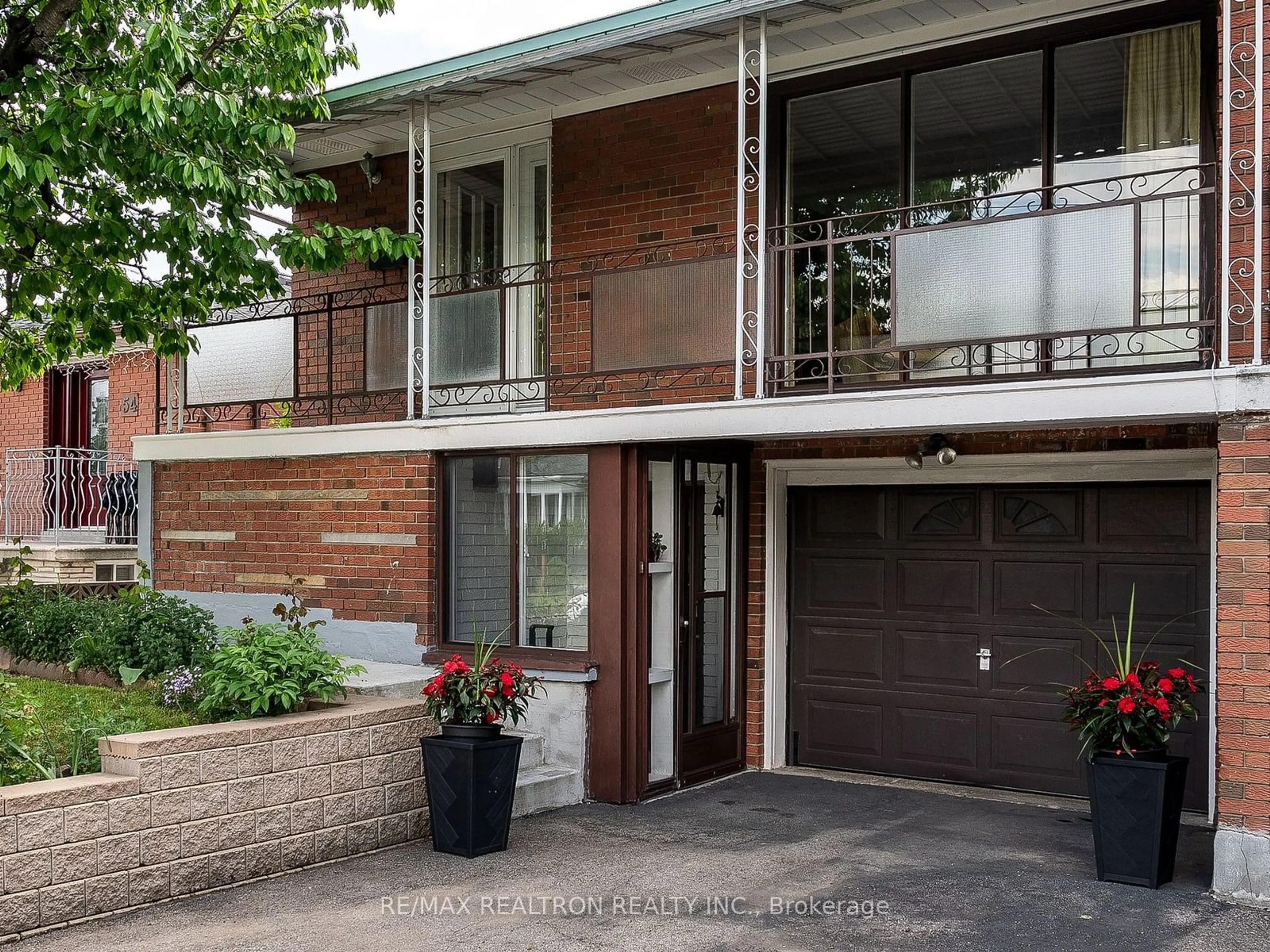 A pic from exterior of the house or condo, the front or back of building for 52 Magellan Dr, Toronto Ontario M3L 1T2