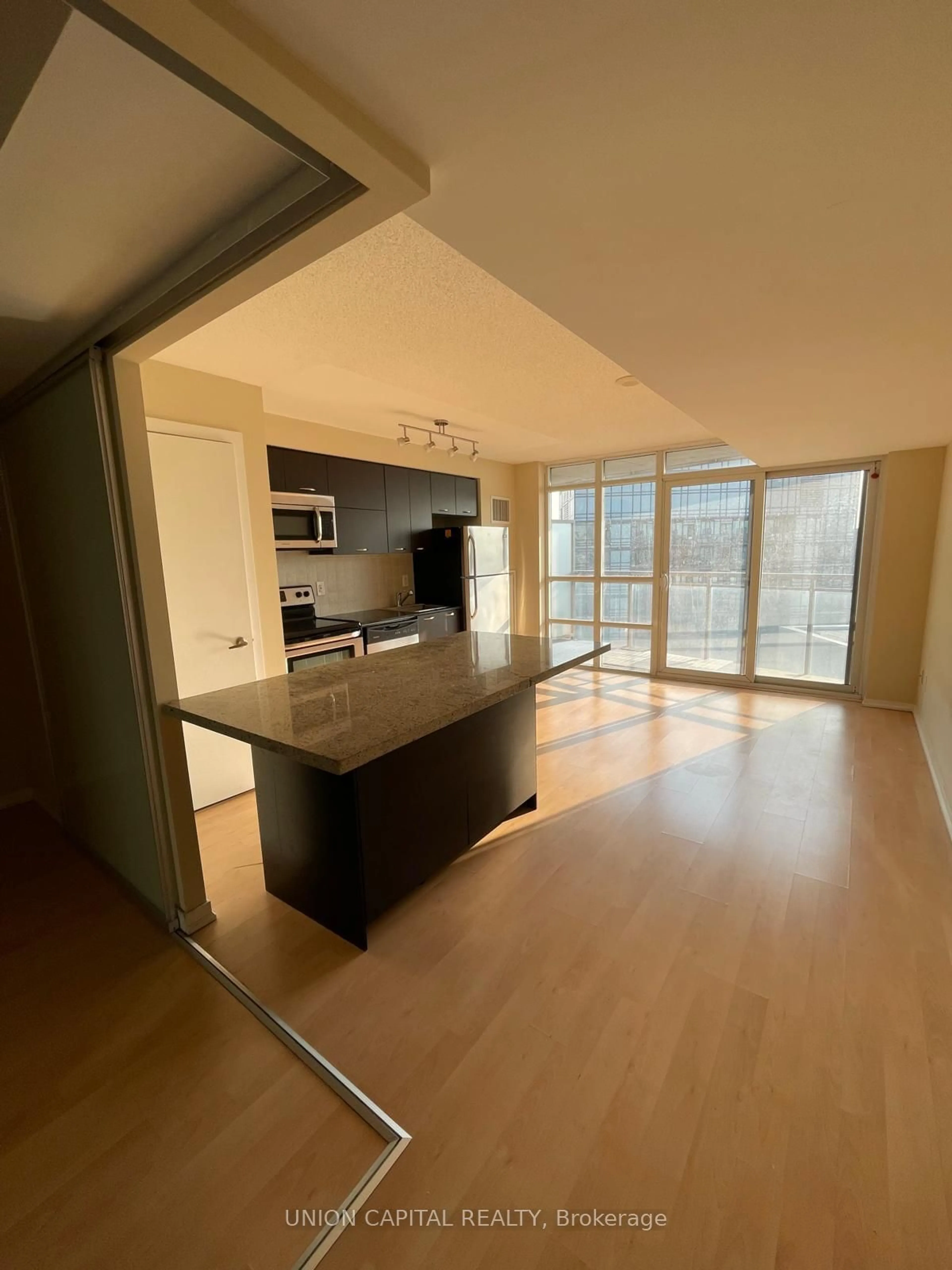 A pic of a room, wood floors for 38 Joe Shuster Way #1801, Toronto Ontario M6K 0A5