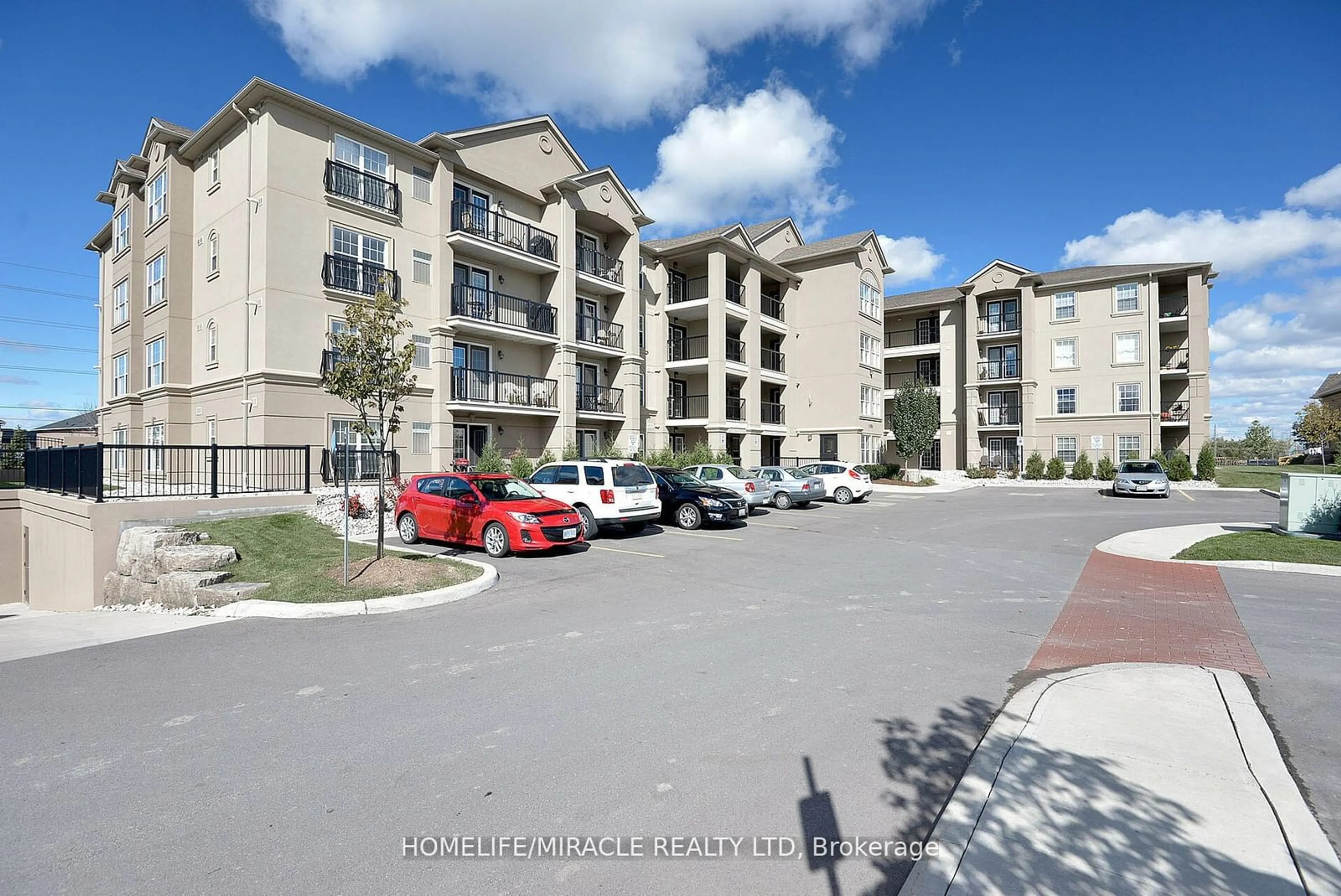 A pic from exterior of the house or condo, the street view for 1380 Main St #305, Milton Ontario L9T 7S4