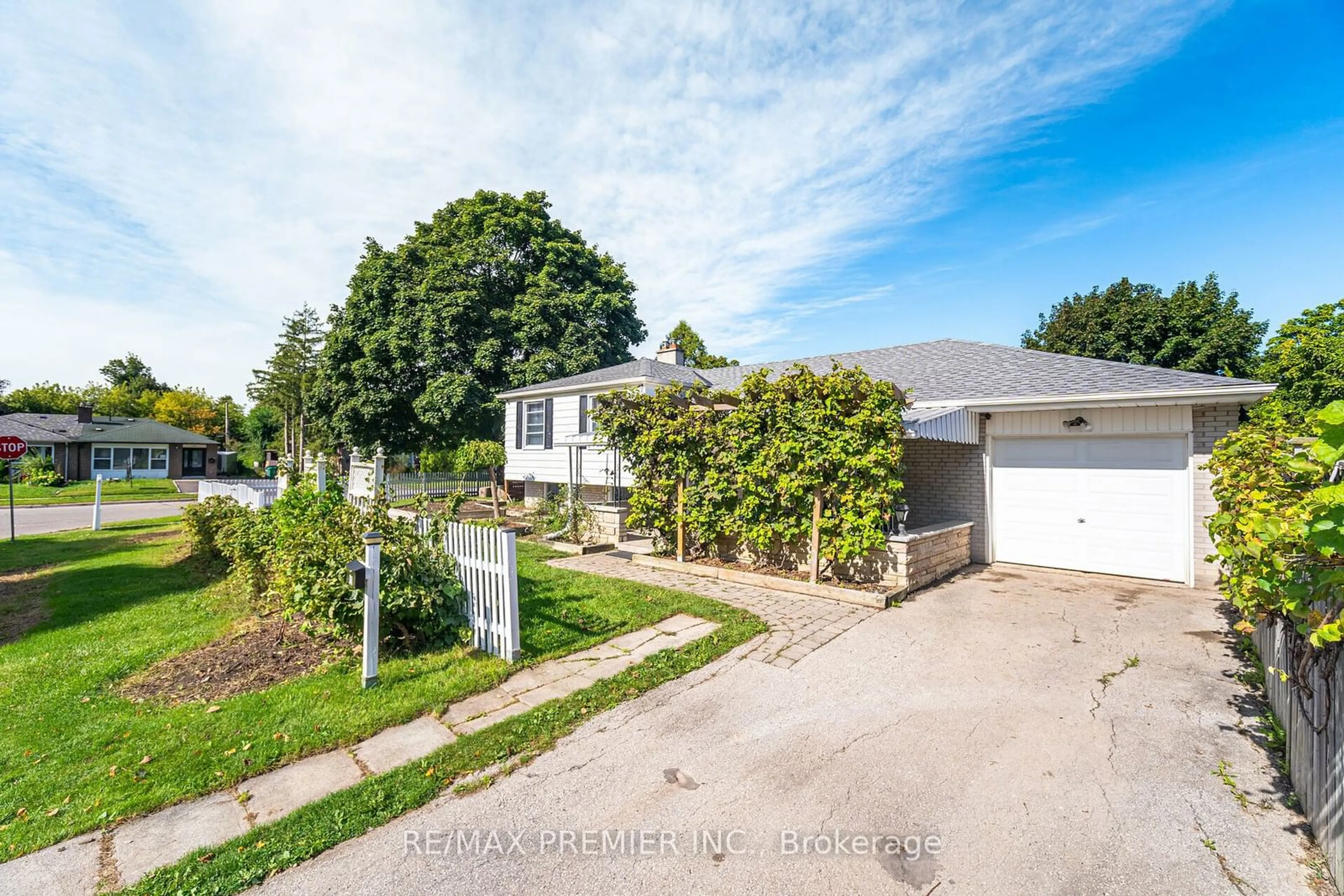 A pic from exterior of the house or condo, the fenced backyard for 164 Avondale Blvd, Brampton Ontario L6T 1J2