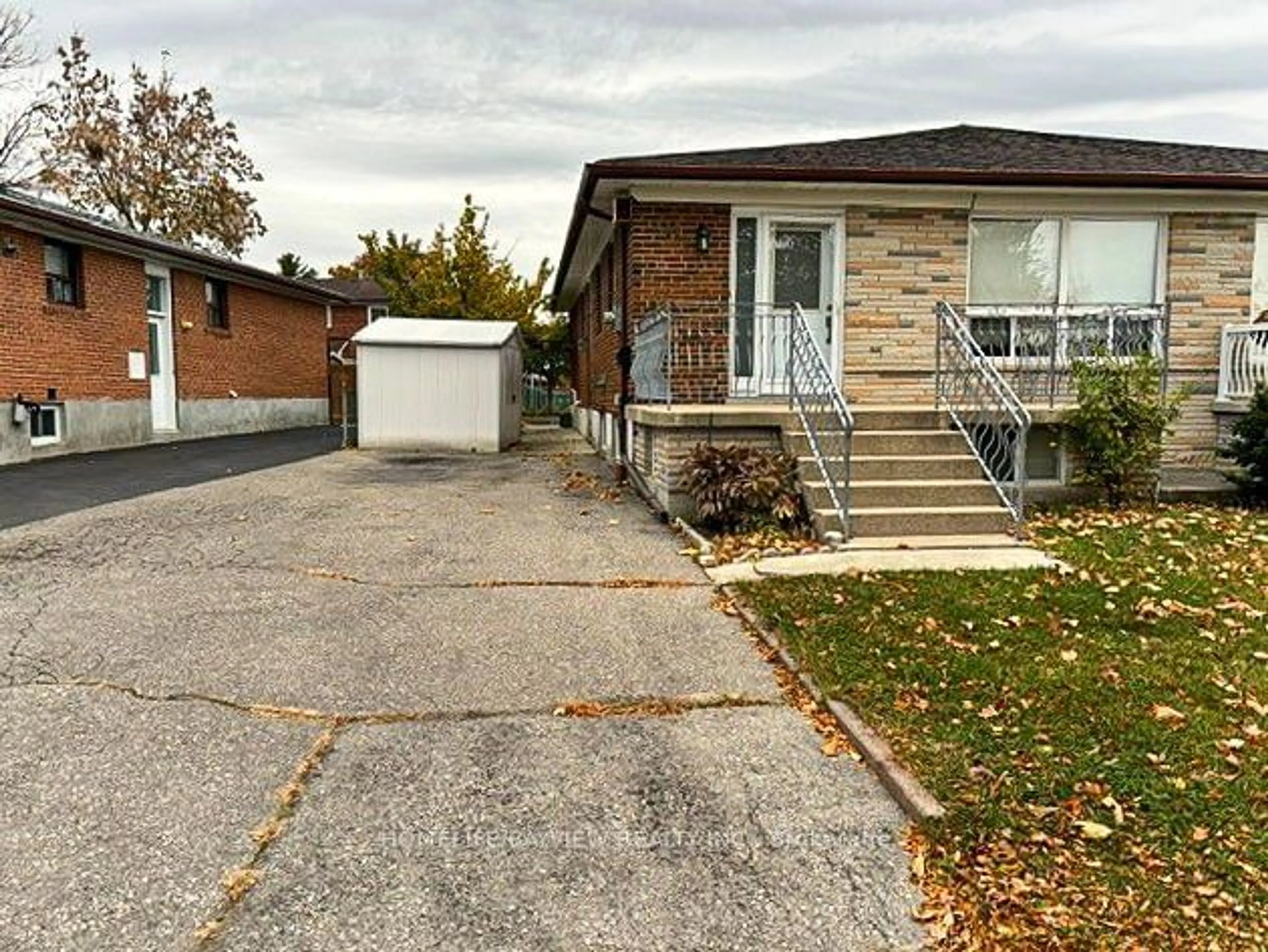 Frontside or backside of a home, the street view for 67 DELLBROOK Cres, Toronto Ontario M9L 1E3