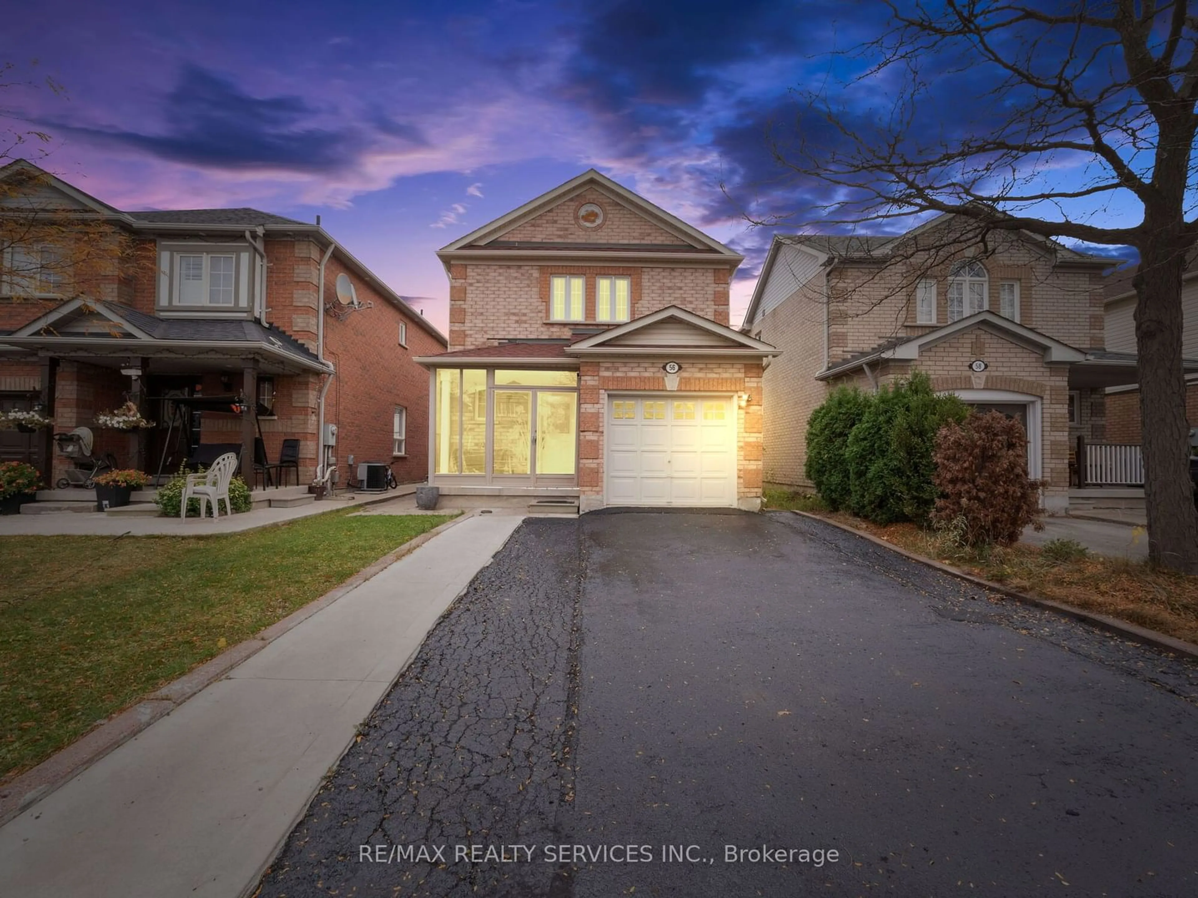 Frontside or backside of a home, the street view for 56 Woodhaven Dr, Brampton Ontario L7A 1Y4