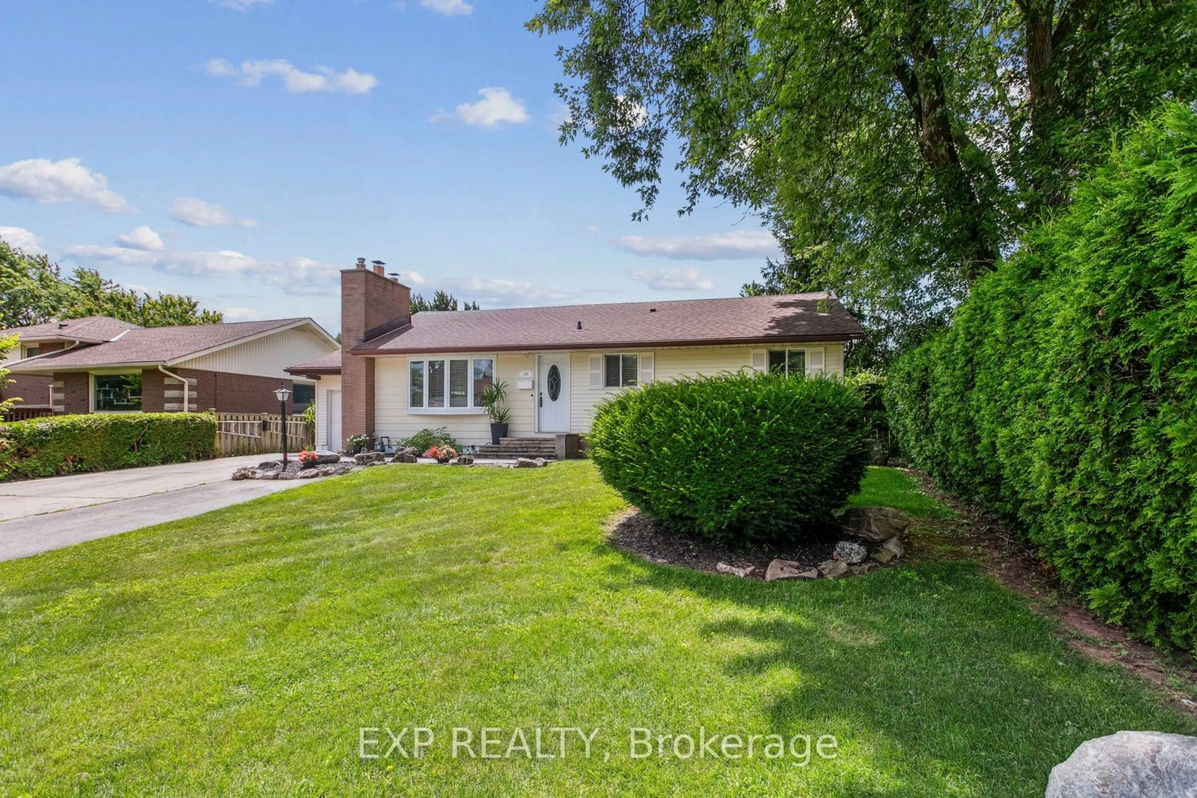 Frontside or backside of a home, the fenced backyard for 148 Boxley Rd, Burlington Ontario L7L 4S1