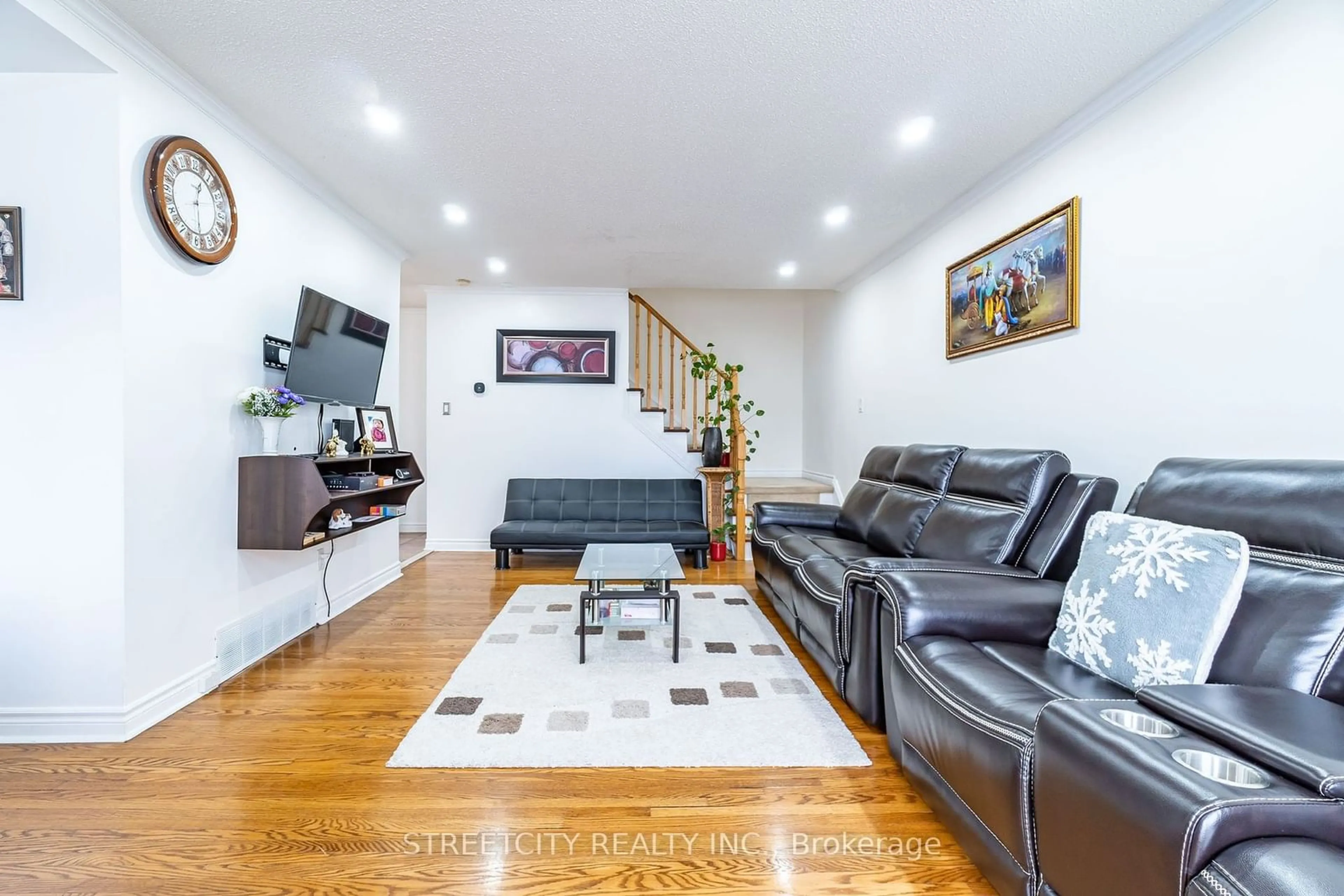 Living room, wood floors for 57 Town House Cres, Brampton Ontario L6W 3C3