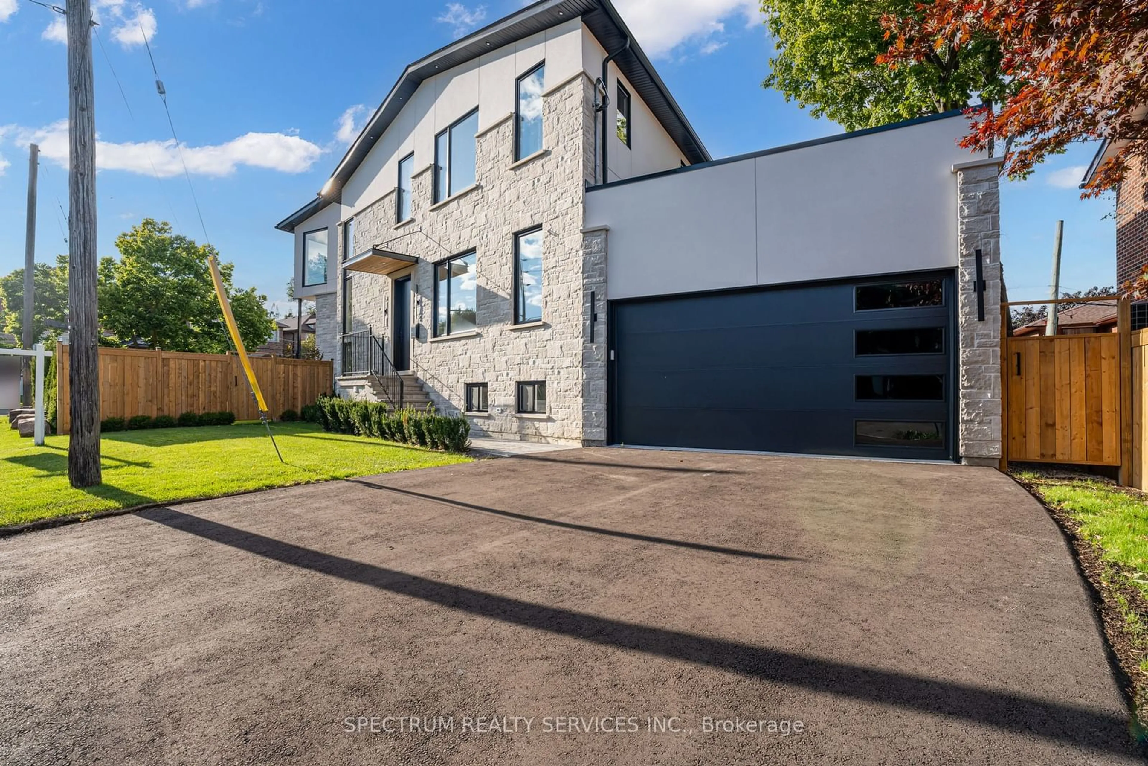 Frontside or backside of a home, the front or back of building for 102 Stayner Ave, Toronto Ontario M6B 1P2