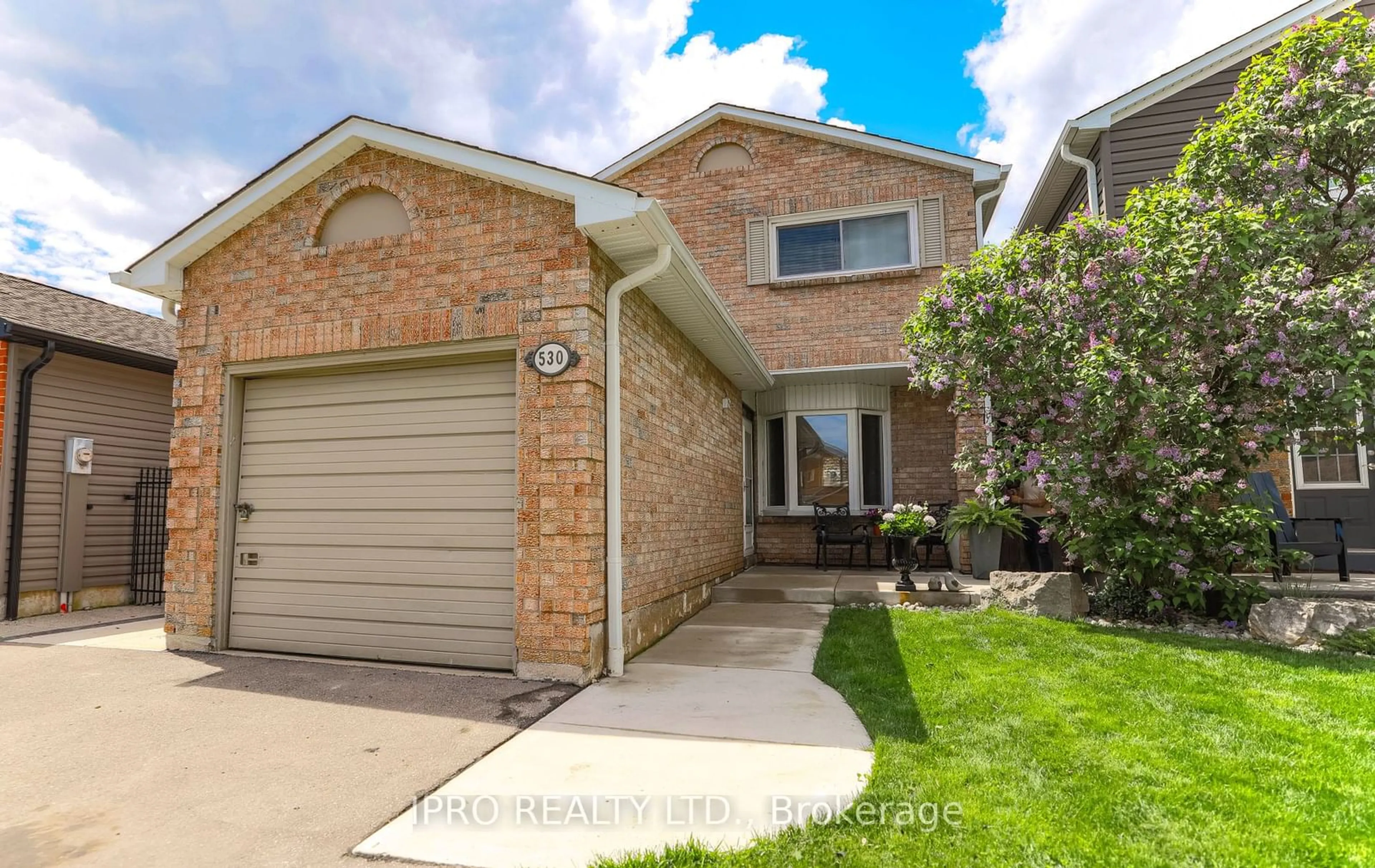 A pic from exterior of the house or condo, the fenced backyard for 530 Roseheath Dr, Milton Ontario L9T 4V6