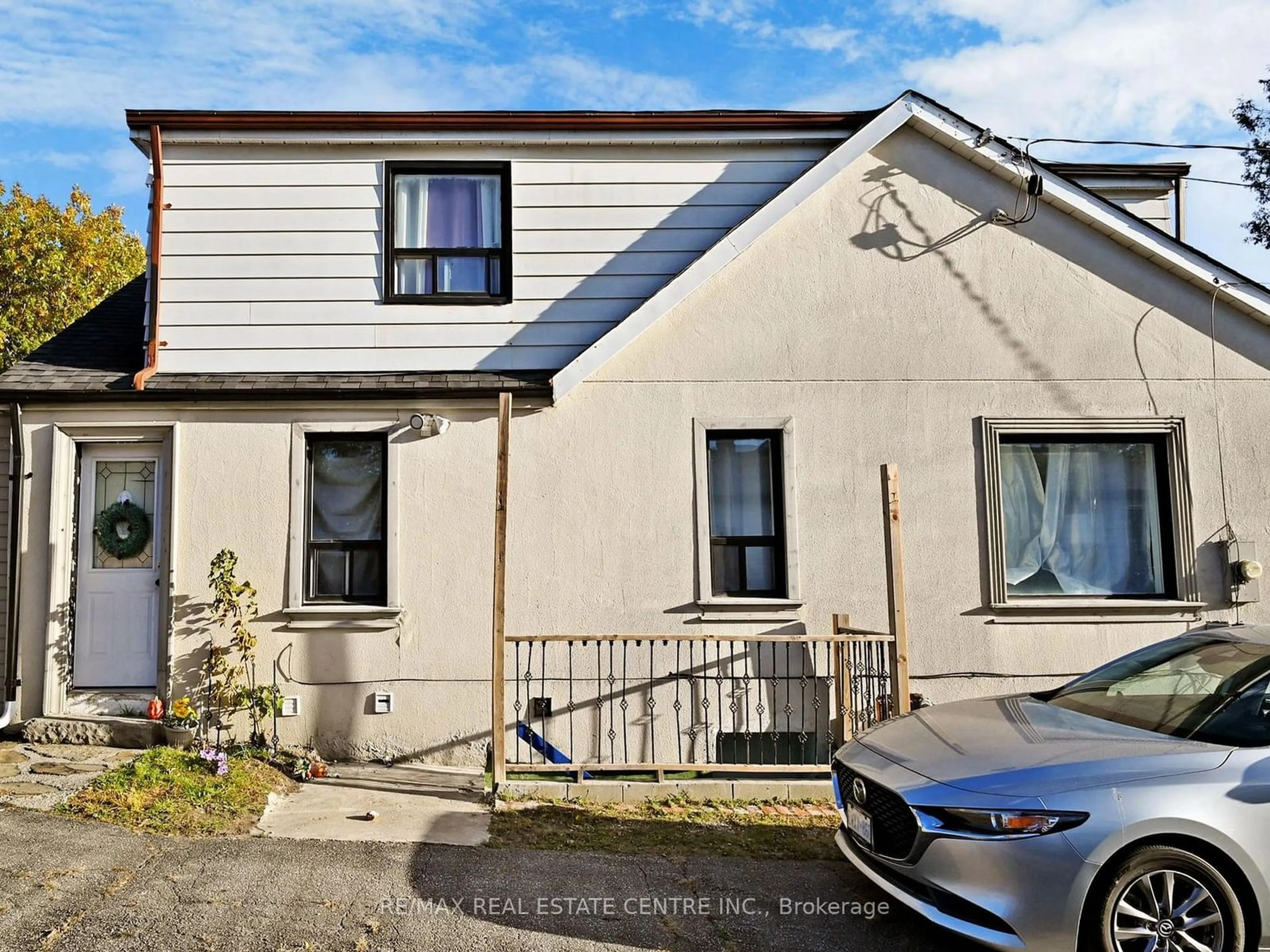 Frontside or backside of a home, the street view for 2211 Camilla Rd, Mississauga Ontario L5A 2K2