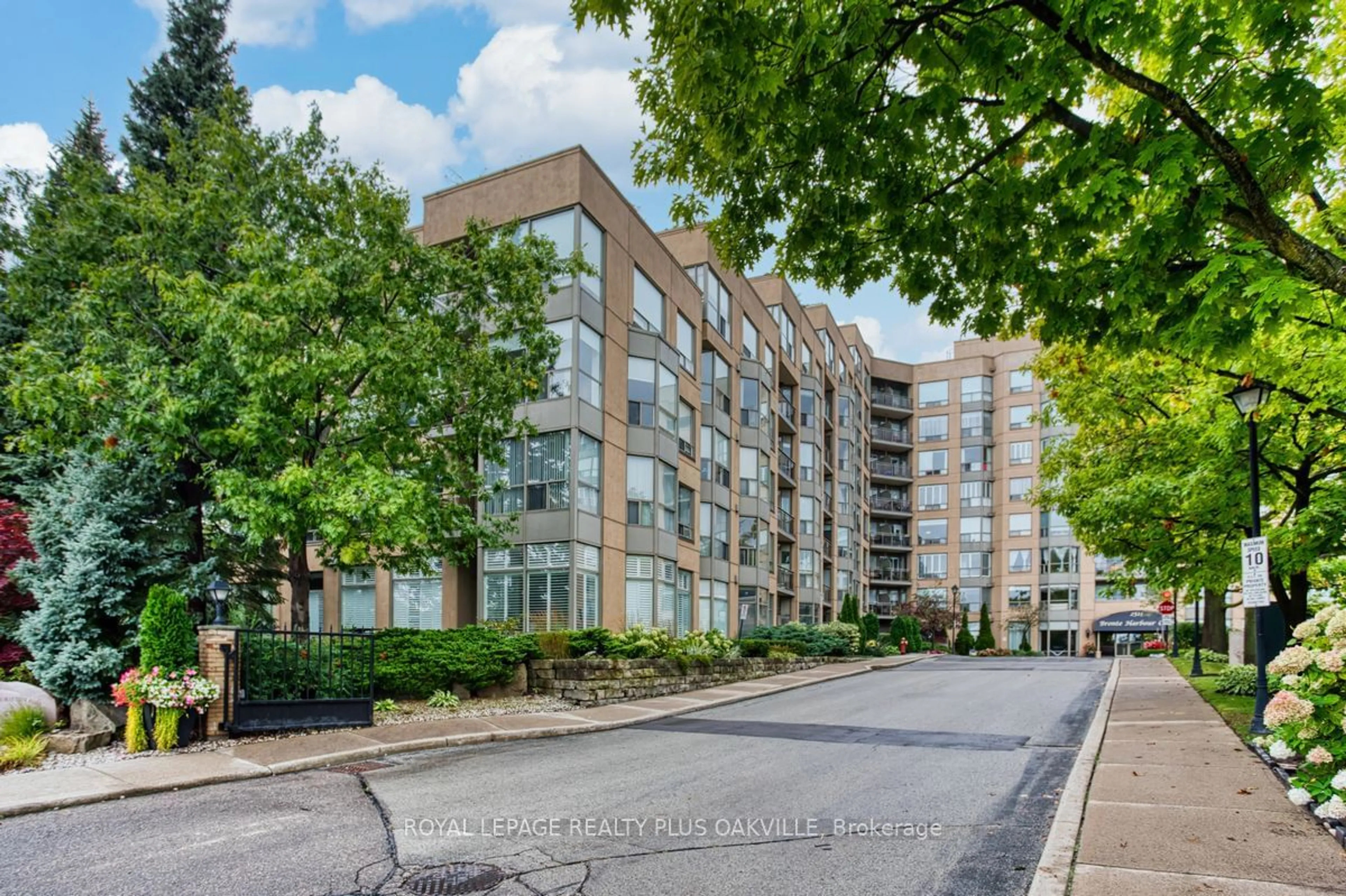 A pic from exterior of the house or condo, the street view for 2511 Lakeshore Rd #517, Oakville Ontario L6L 6L9