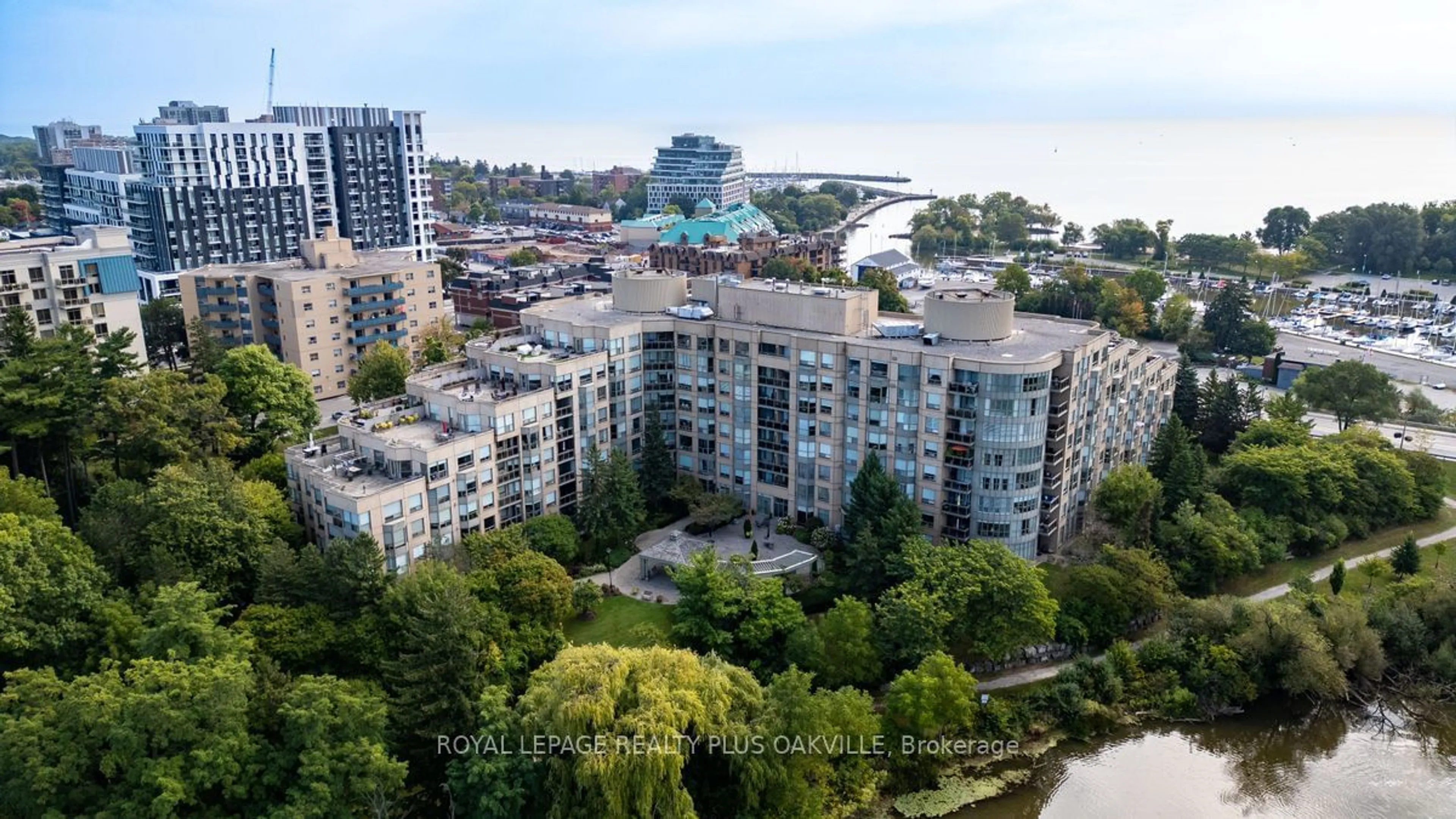 A pic from exterior of the house or condo, the view of city buildings for 2511 Lakeshore Rd #517, Oakville Ontario L6L 6L9