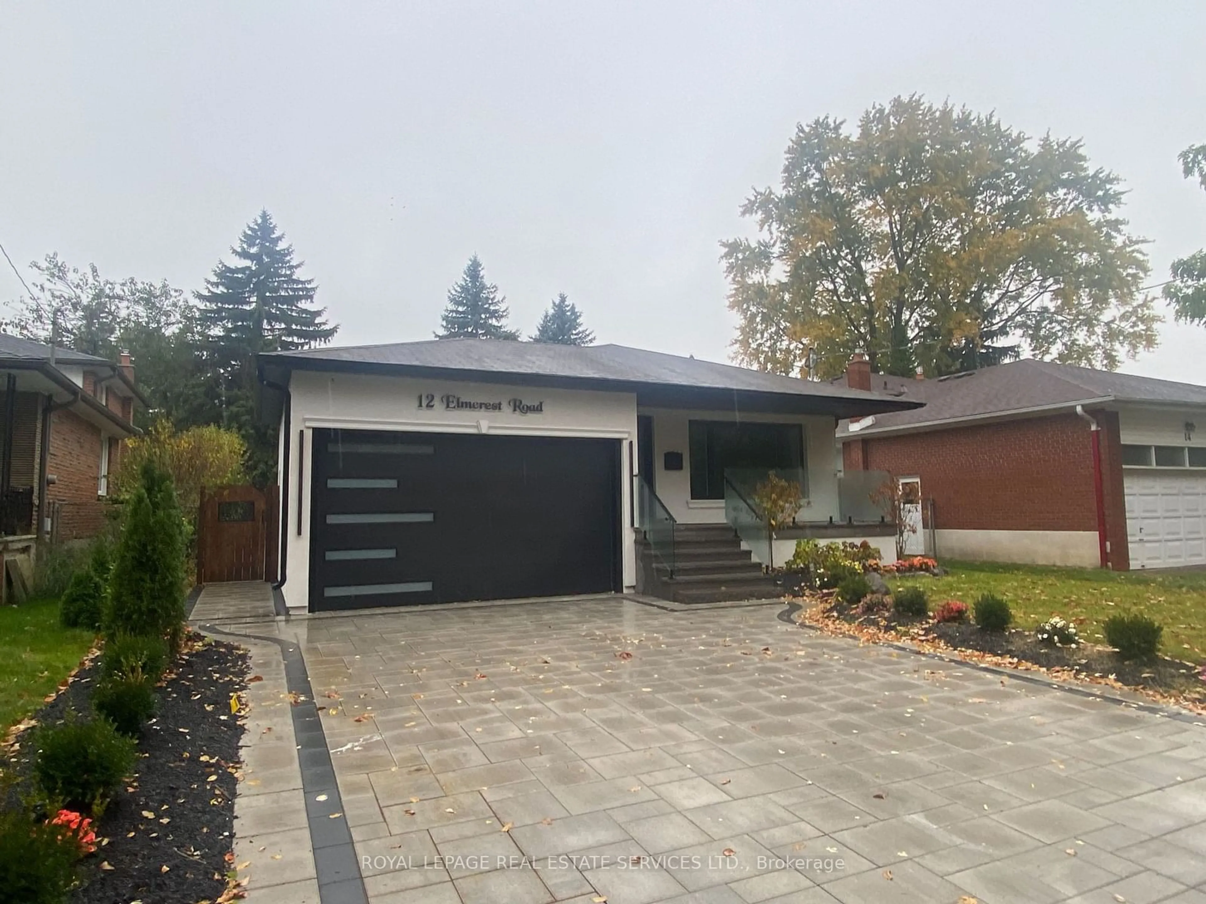 Frontside or backside of a home, cottage for 12 Elmcrest Rd, Toronto Ontario M9C 3R8