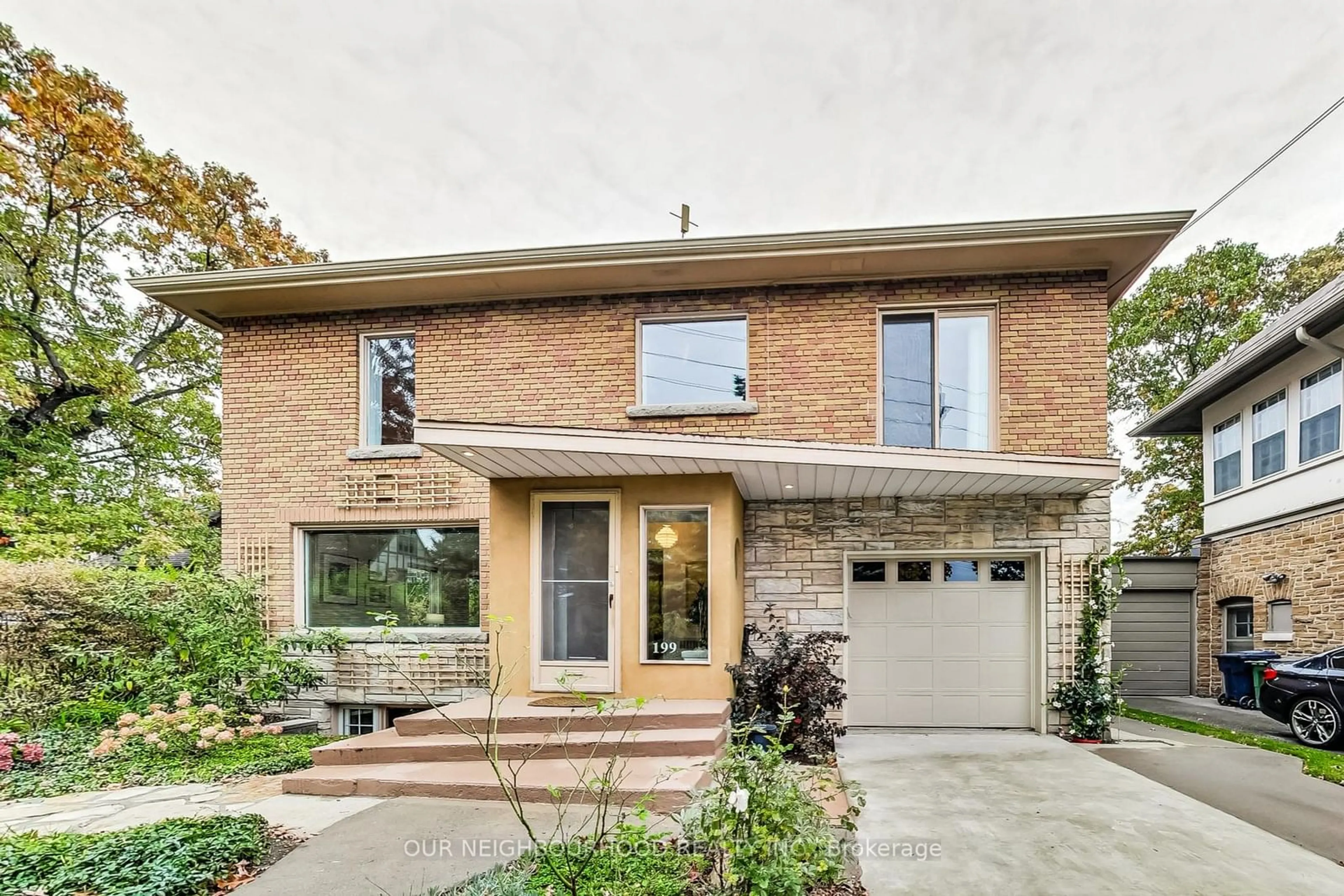 Home with brick exterior material for 199 Riverside Dr, Toronto Ontario M6S 4A8