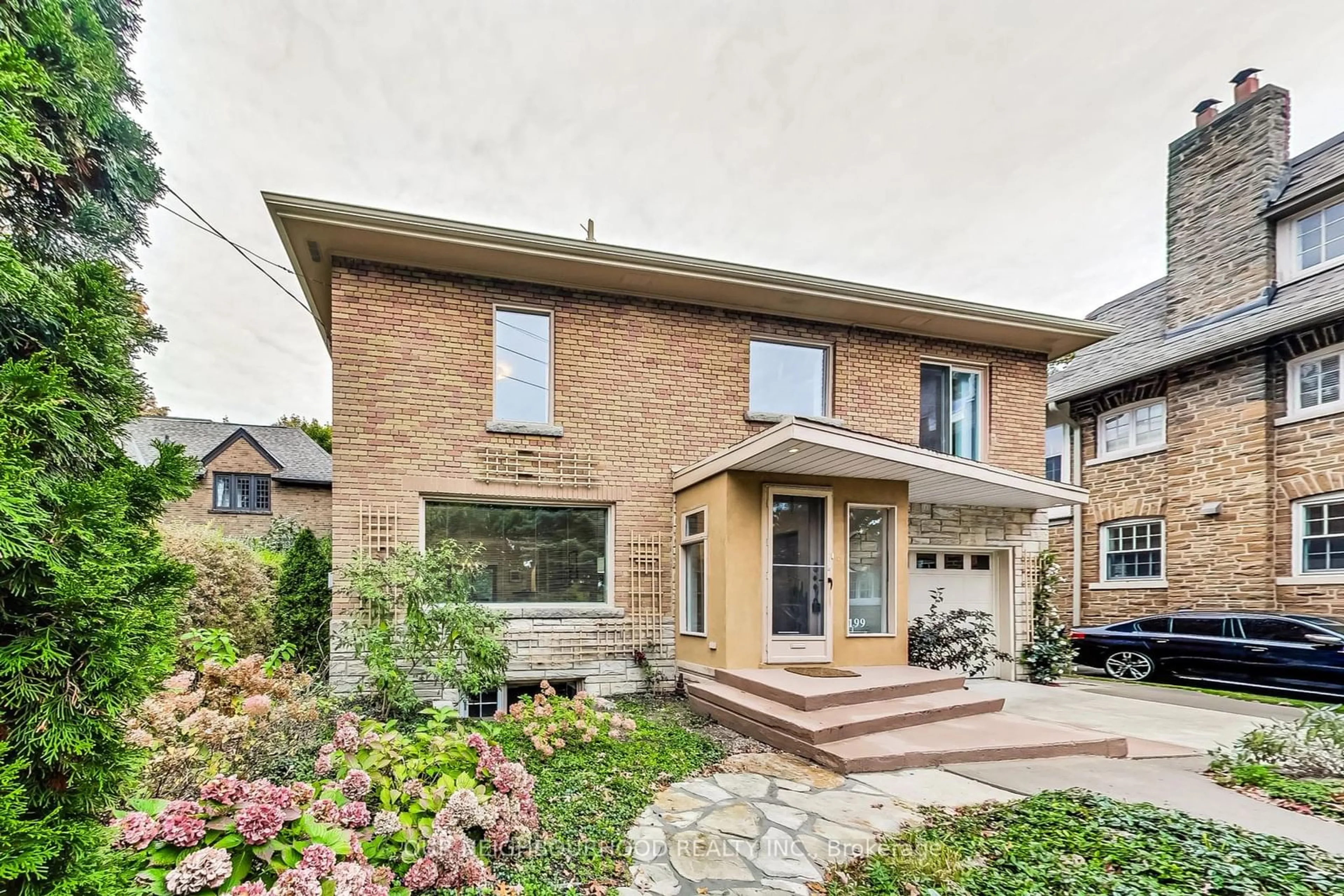 Home with brick exterior material for 199 Riverside Dr, Toronto Ontario M6S 4A8