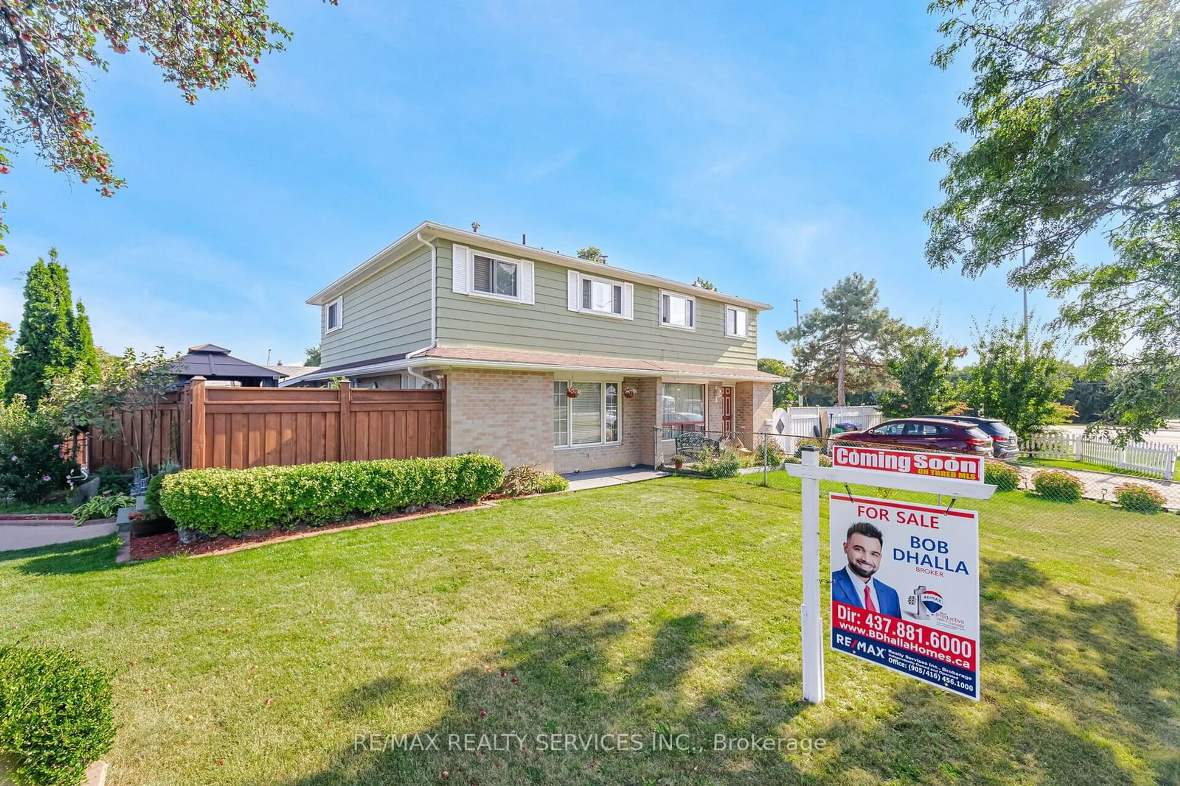 Frontside or backside of a home, the fenced backyard for 97 Juniper Cres, Brampton Ontario L6S 1J9