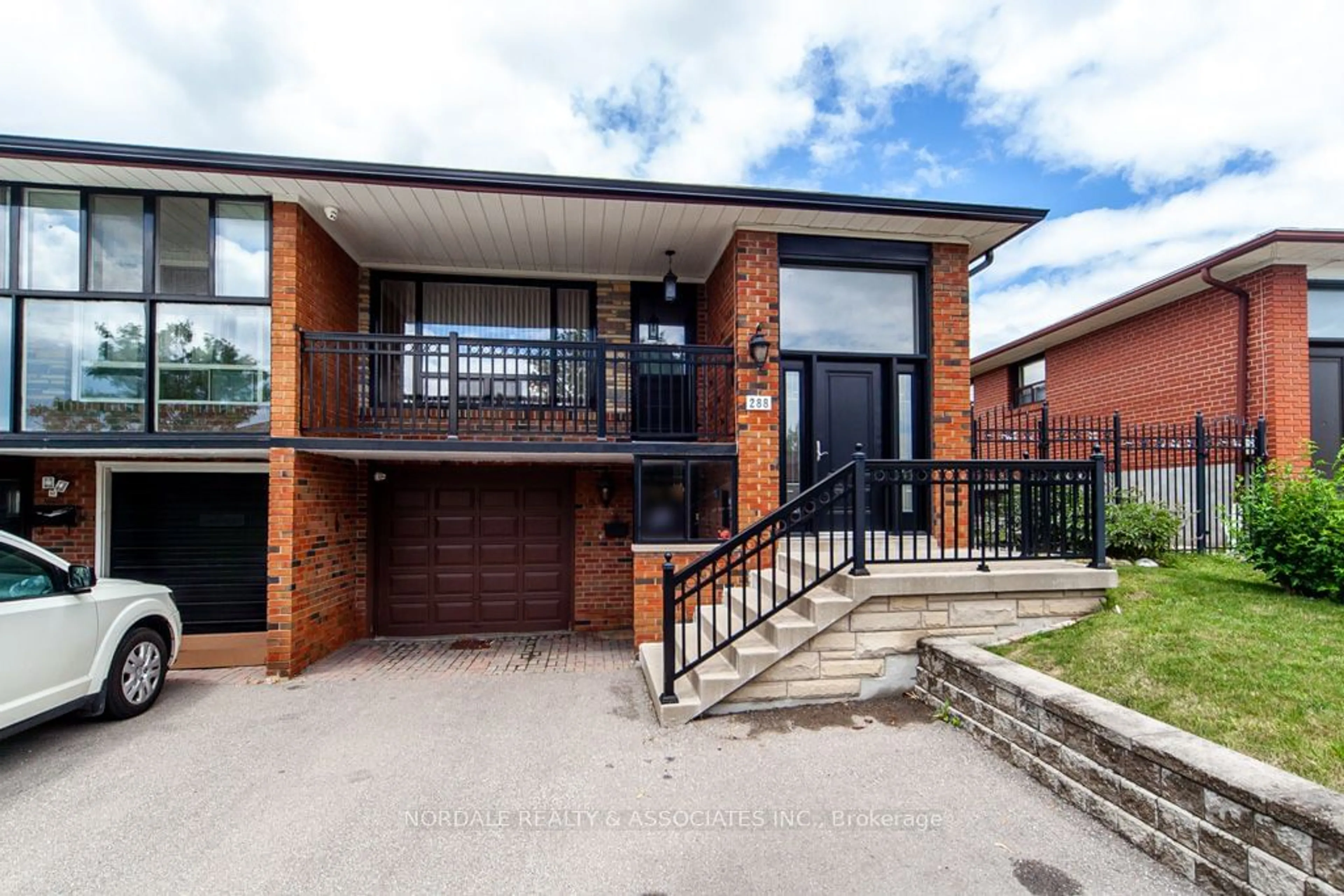 Home with brick exterior material for 288 Hullmar Dr, Toronto Ontario M3N 2G1