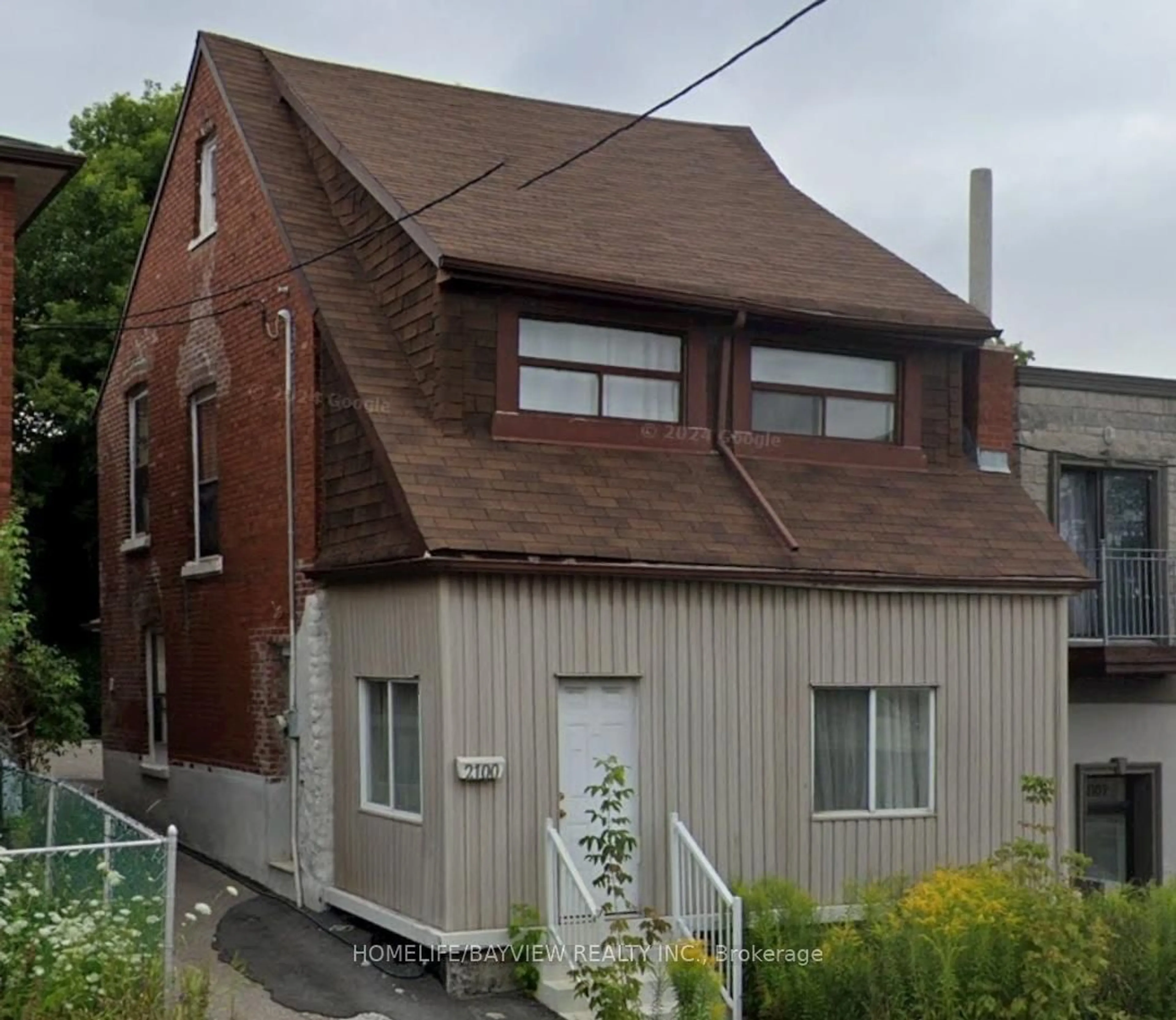 Frontside or backside of a home, the front or back of building for 2100 Dufferin St, Toronto Ontario M6E 3R7