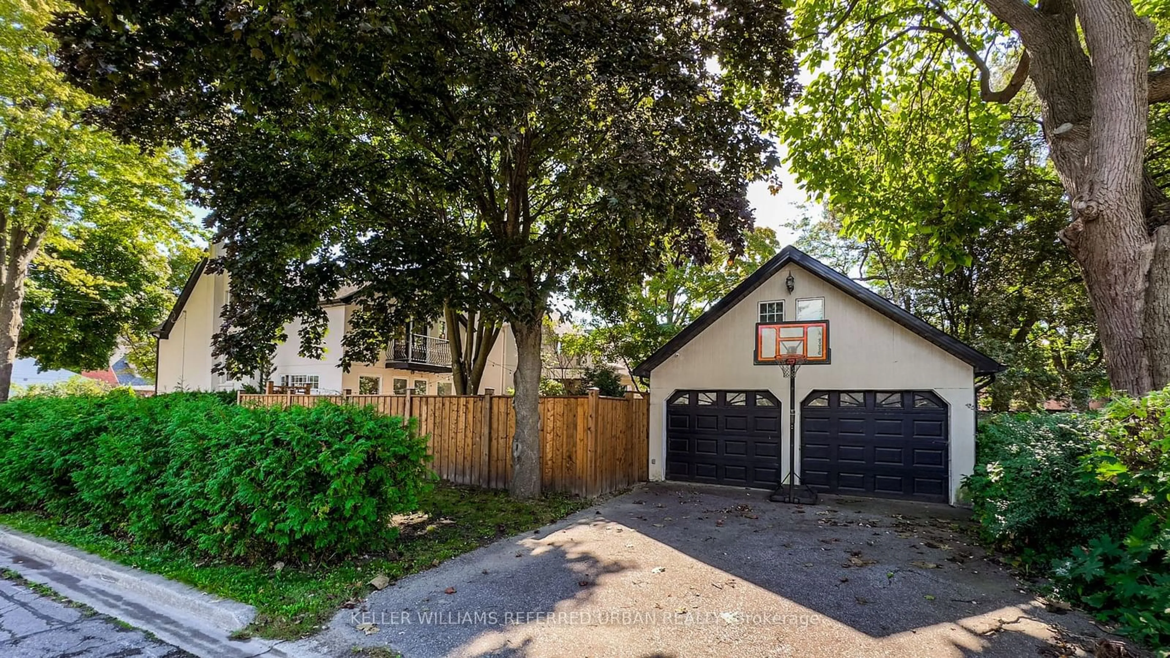 Frontside or backside of a home, the fenced backyard for 88 Botfield Ave, Toronto Ontario M9B 4E4