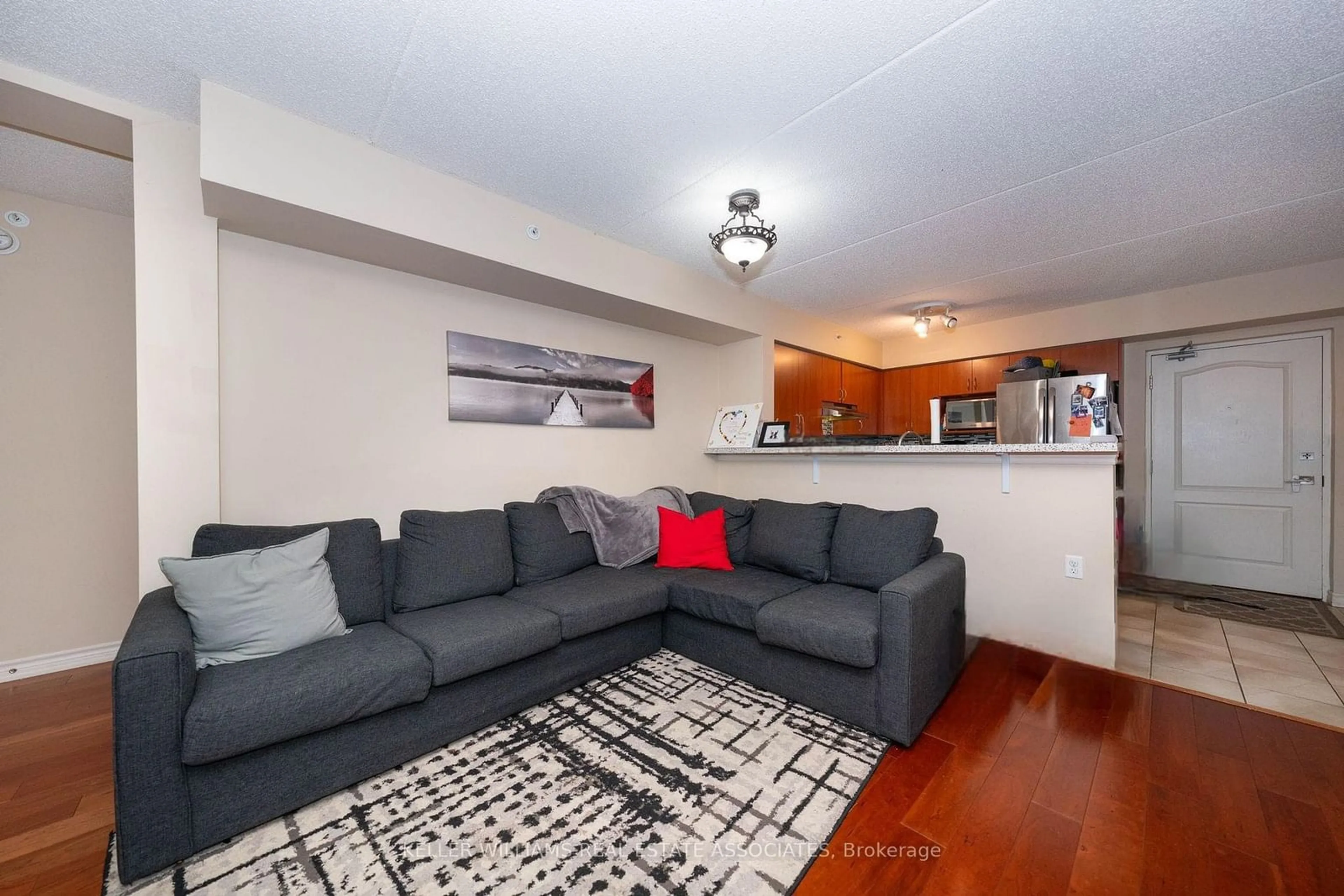 Living room, wood floors for 1440 Main St #110, Milton Ontario L9T 8W3