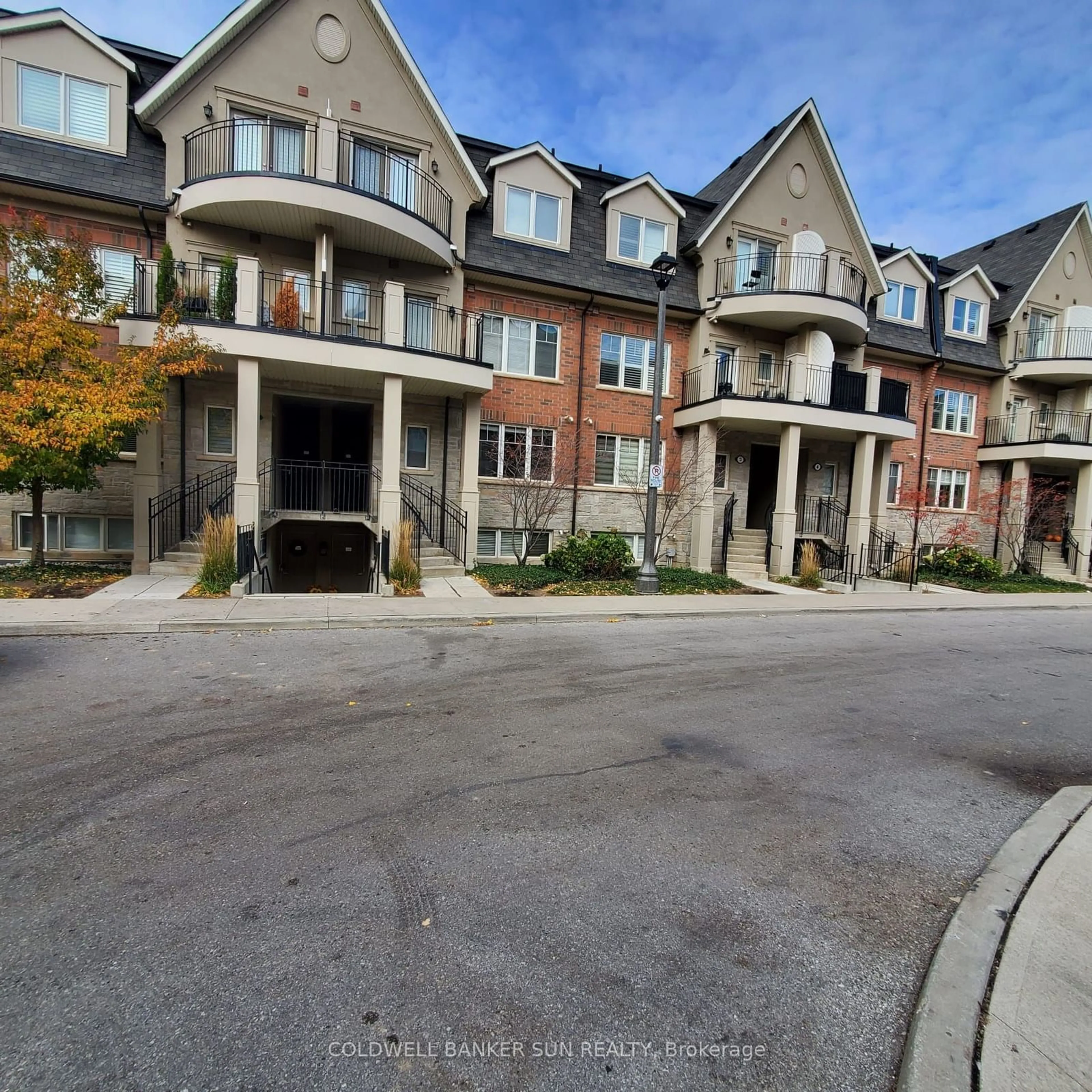 A pic from exterior of the house or condo, the street view for 2420 Baronwood Dr #2-02, Oakville Ontario L6M 0X6