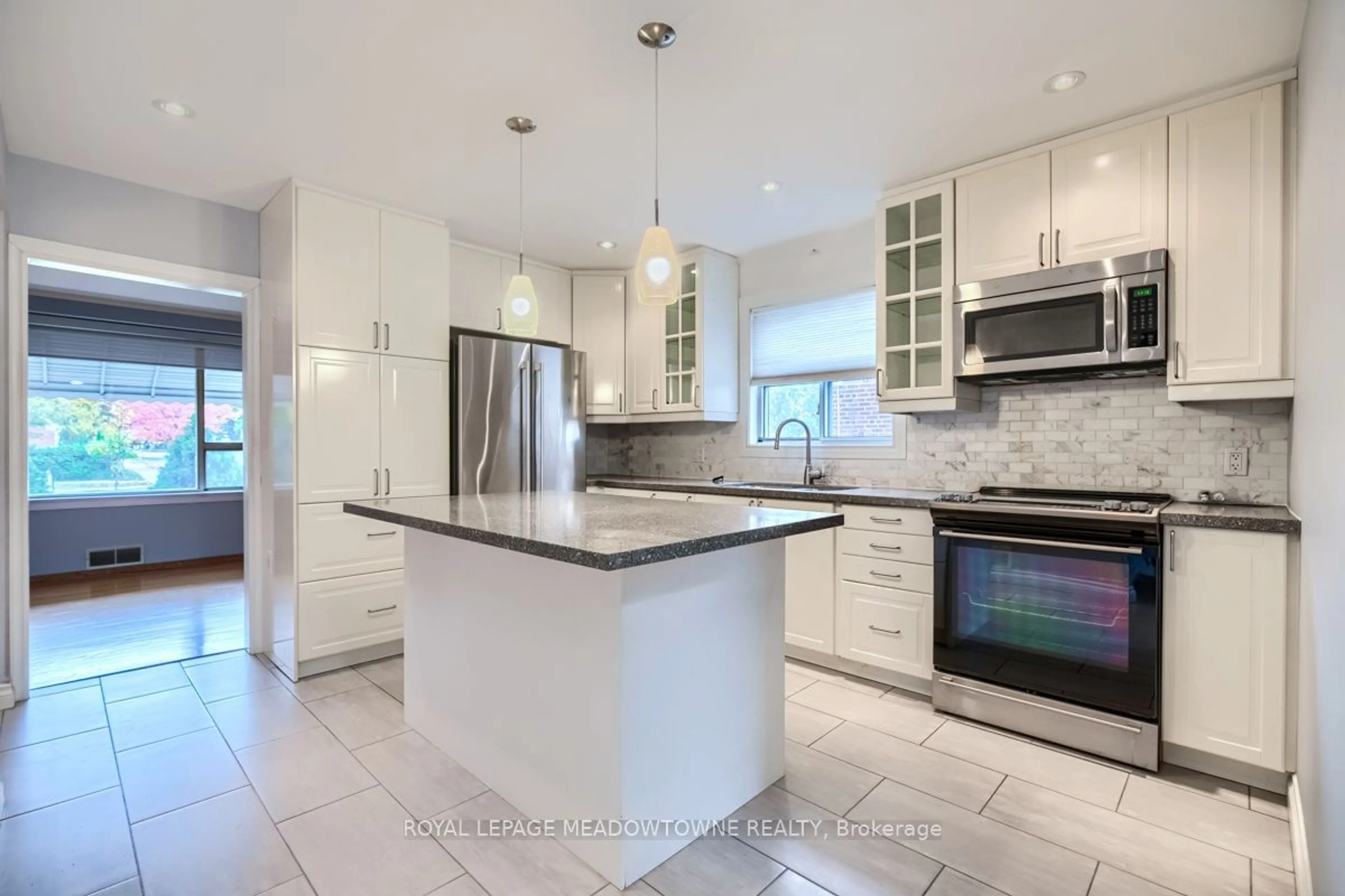 Contemporary kitchen, ceramic floors for 671 Browns Line, Toronto Ontario M8W 3V7