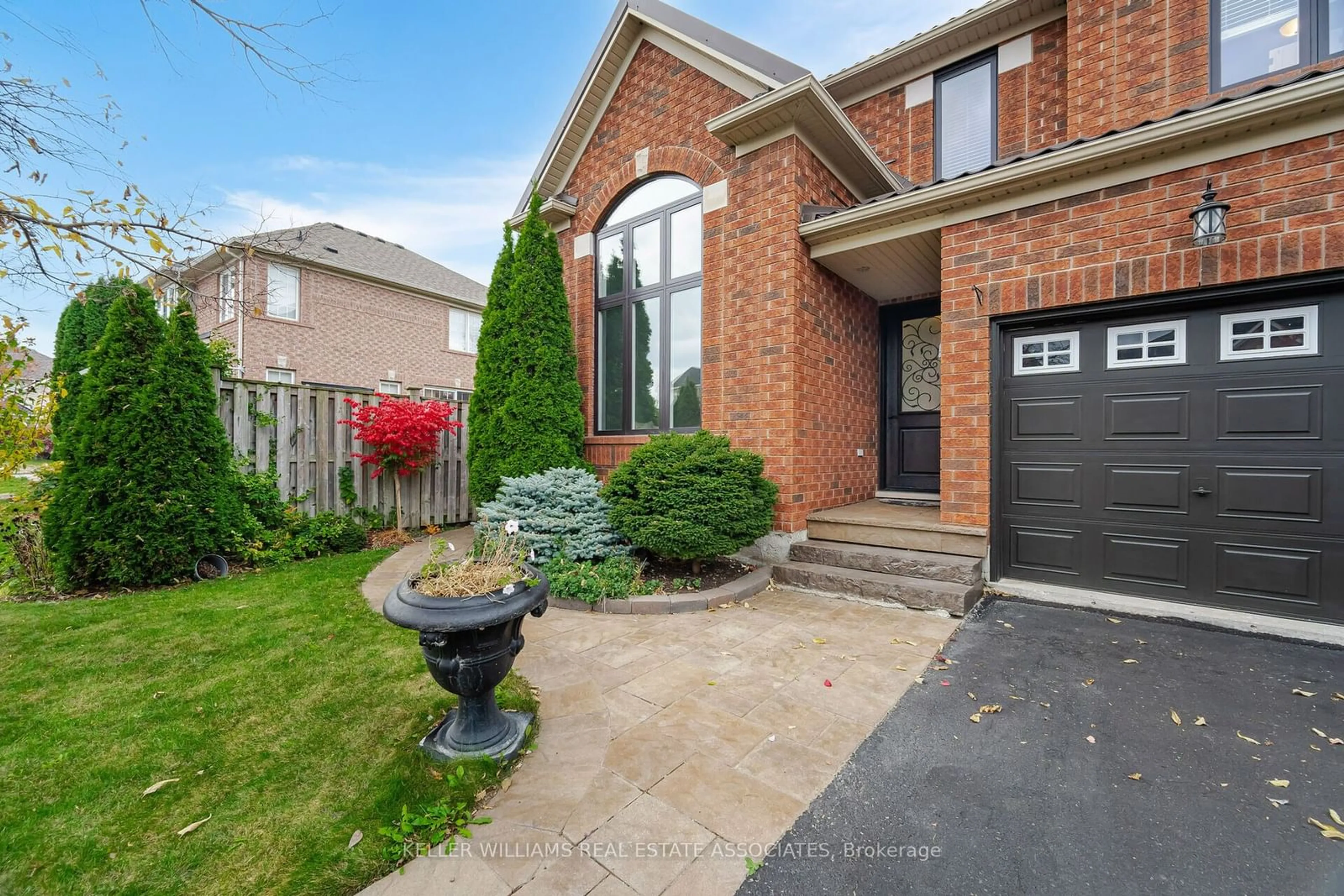 Frontside or backside of a home, the fenced backyard for 4 Listcreek Rd, Brampton Ontario L6P 2N7