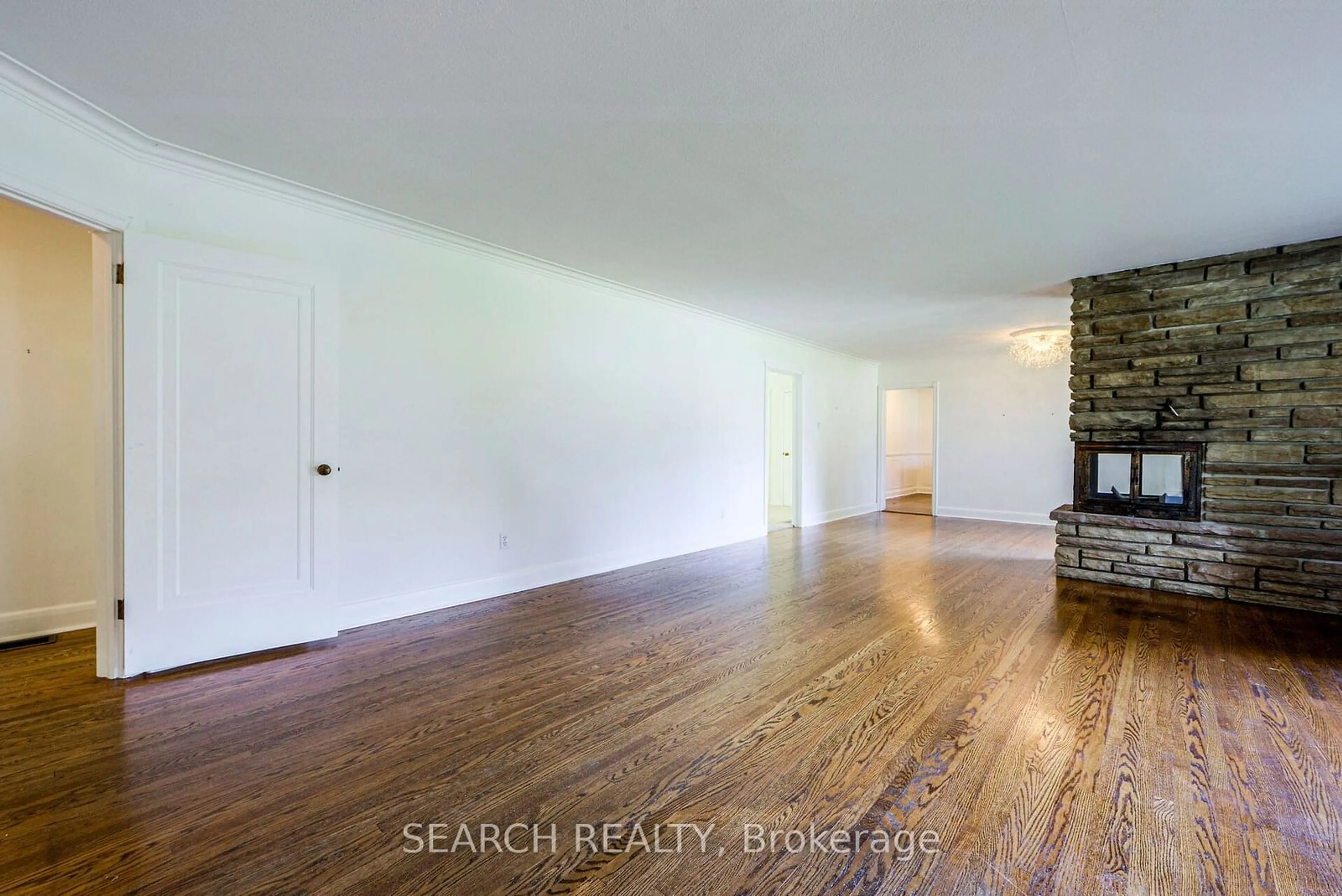 A pic of a room, wood floors for 185 Briarhill Dr, Mississauga Ontario L5G 2N4