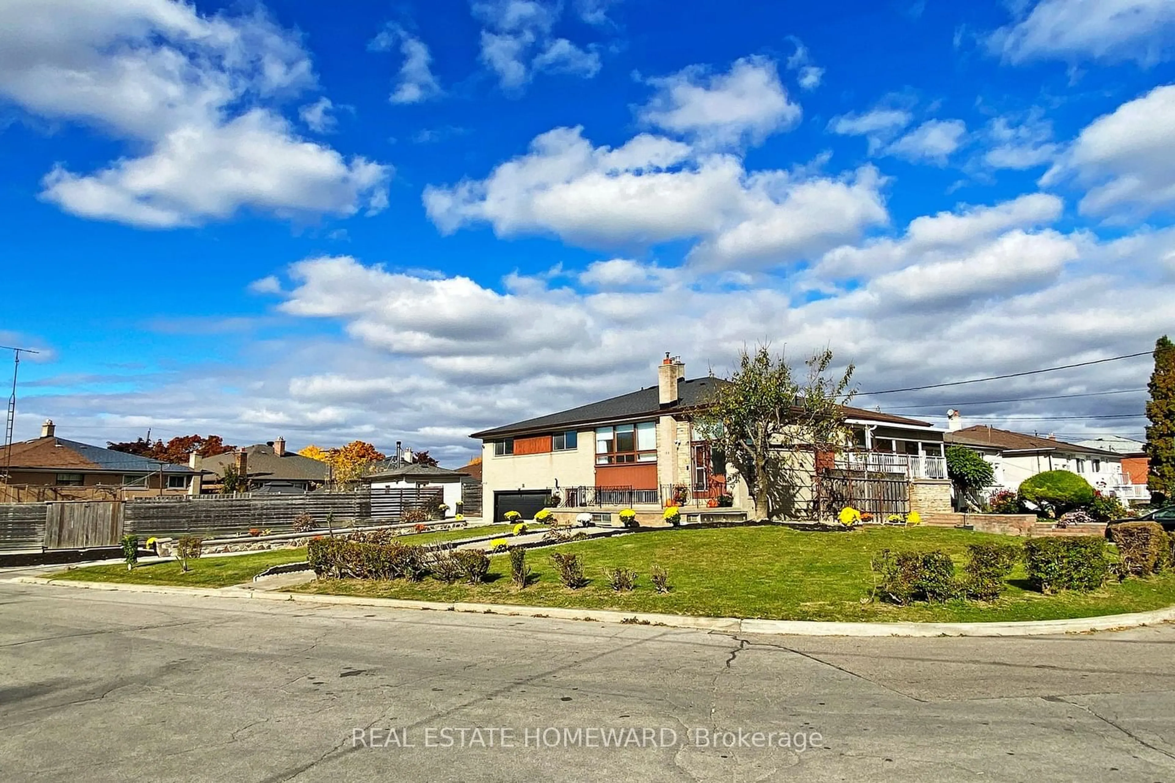 A pic from exterior of the house or condo, the street view for 16 Thwaite Ave, Toronto Ontario M3L 2C7