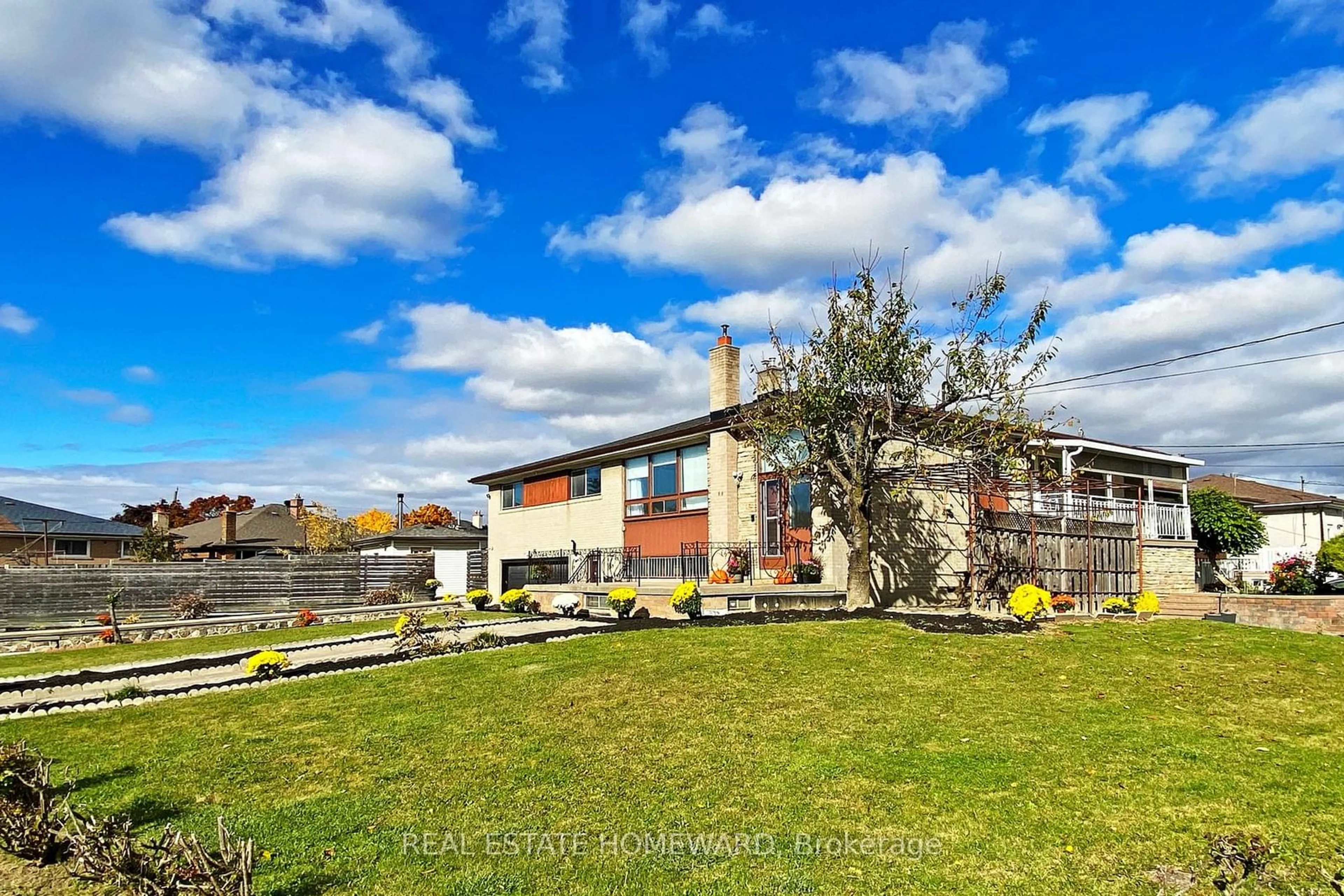 A pic from exterior of the house or condo, the fenced backyard for 16 Thwaite Ave, Toronto Ontario M3L 2C7