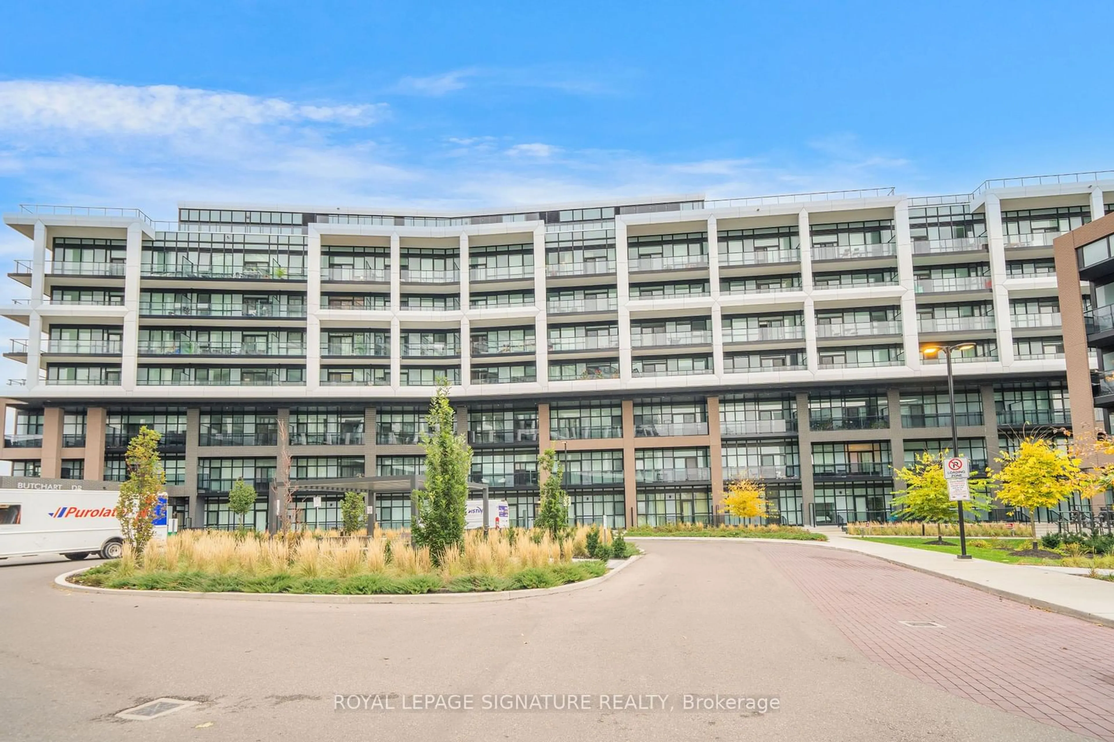 A pic from exterior of the house or condo, the front or back of building for 50 George Butchart Dr #202, Toronto Ontario M3K 0C9