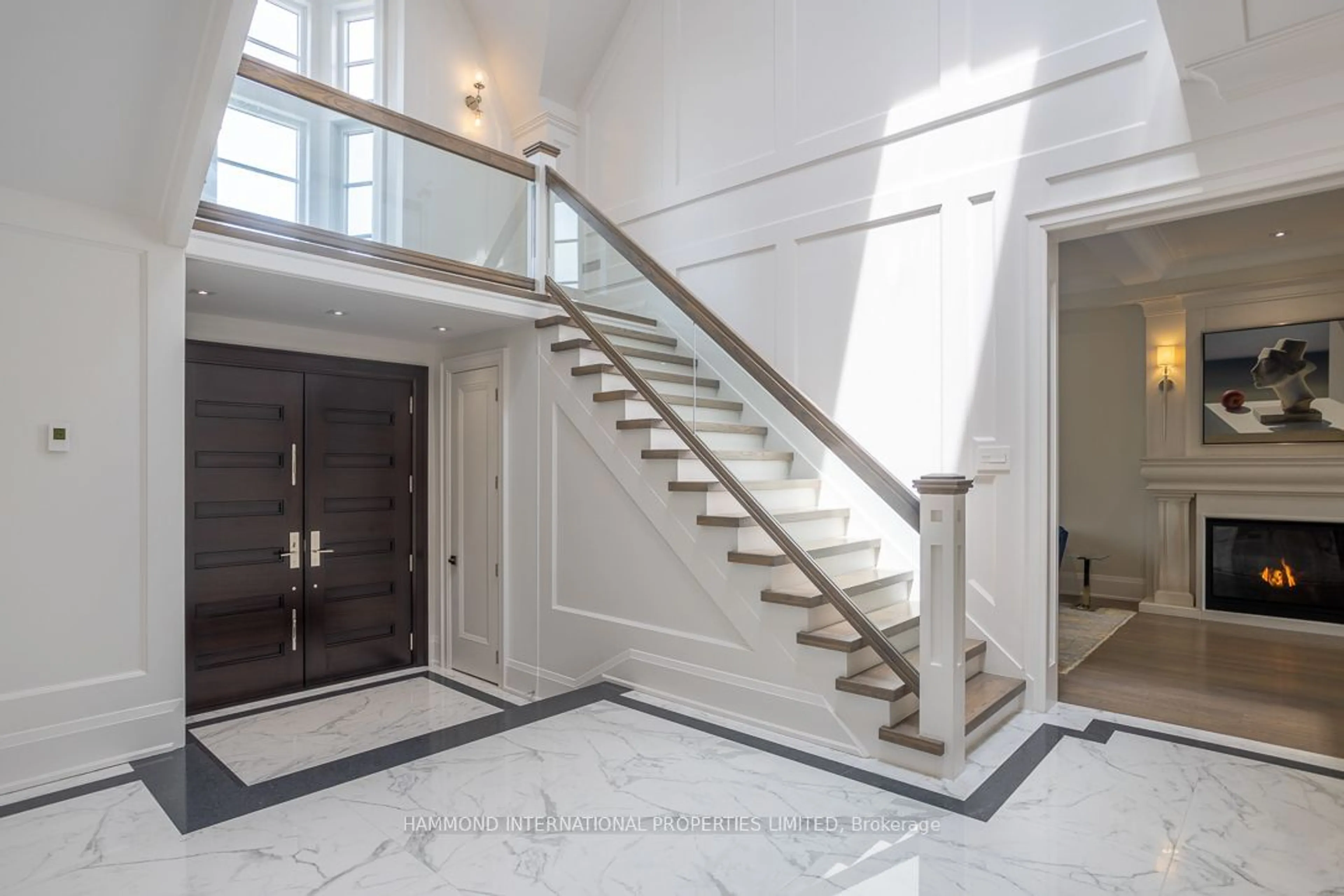 Indoor foyer, wood floors for 31 Twyford Rd, Toronto Ontario M9A 1W3