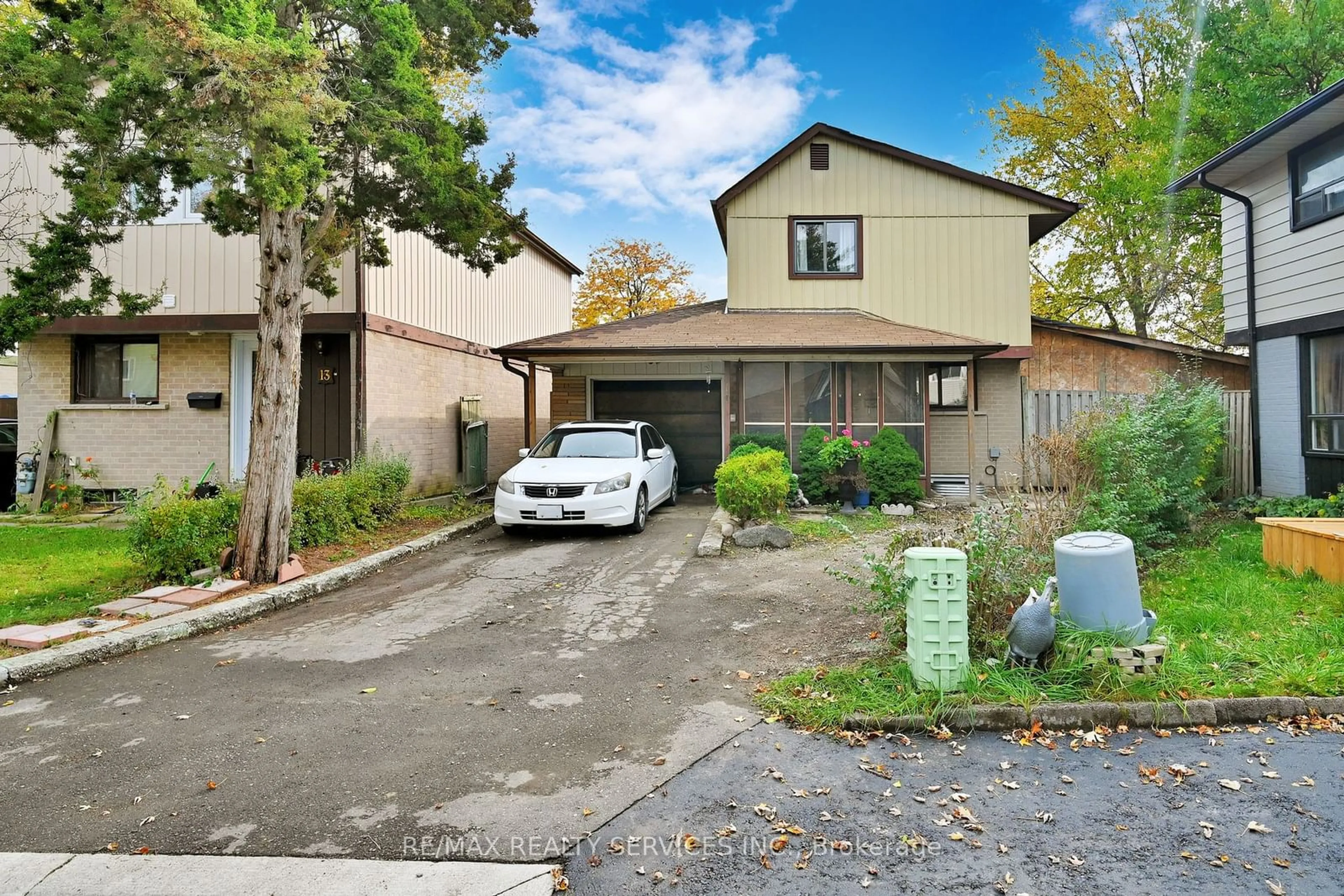 A pic from exterior of the house or condo, the street view for 14 Greenhills Sq, Brampton Ontario L6S 2J4