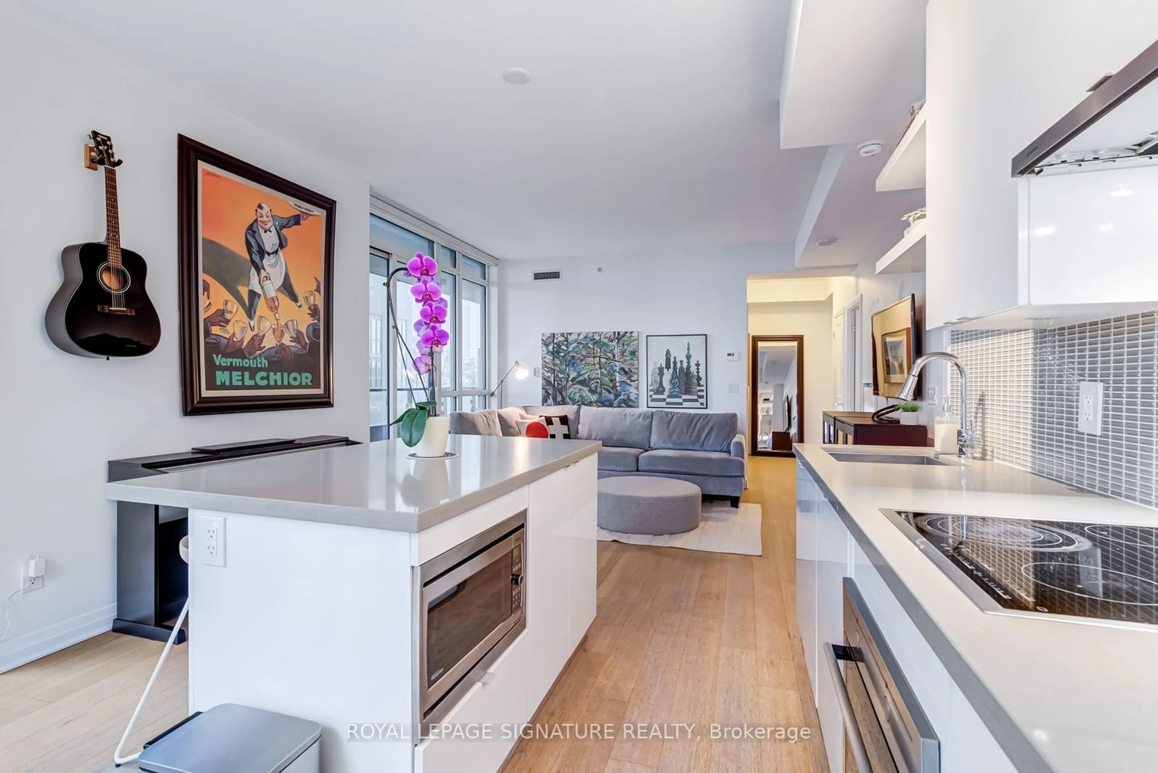 Contemporary kitchen, wood floors for 60 Annie Craig Dr #B415, Toronto Ontario M8V 0C4