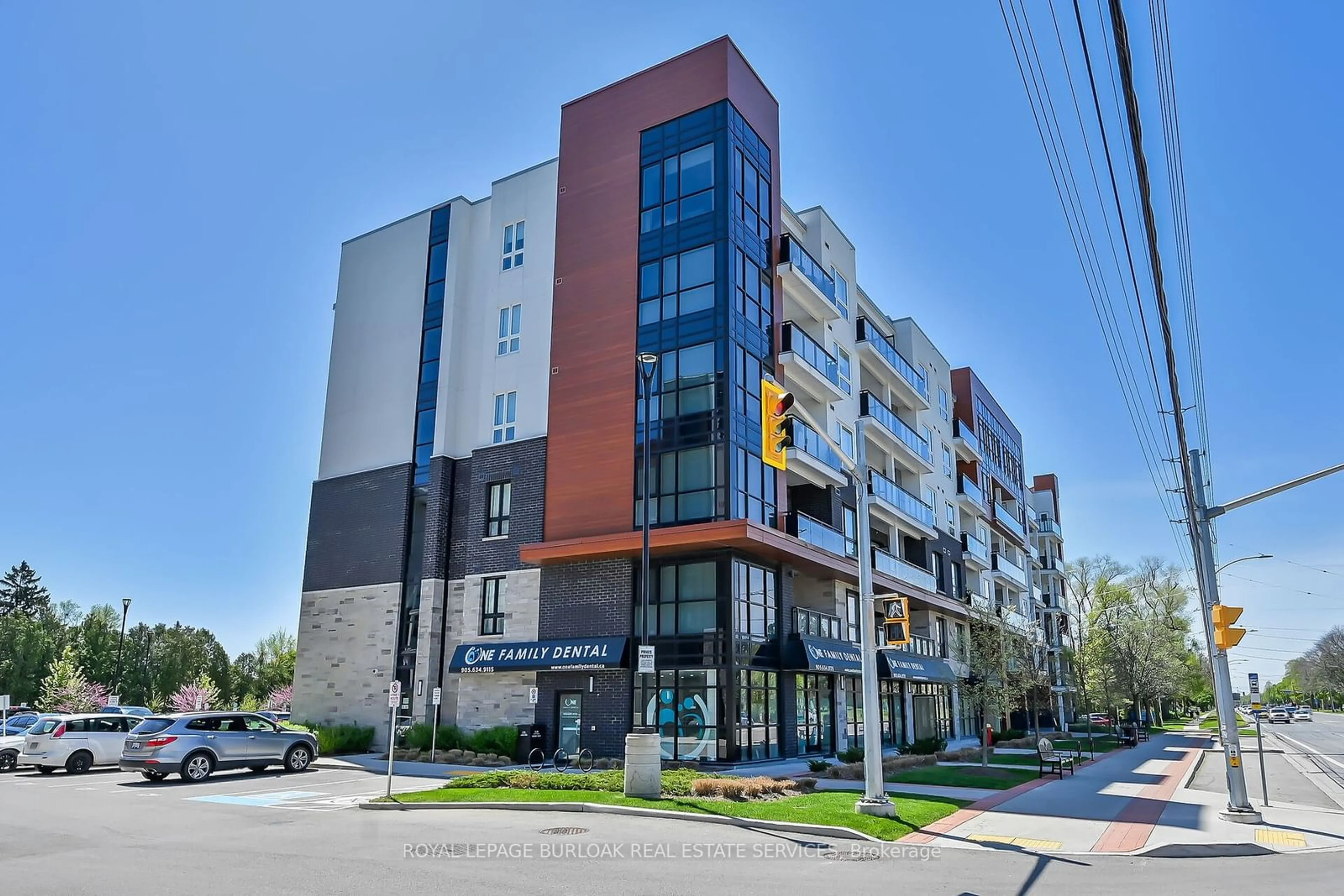 A pic from exterior of the house or condo, the front or back of building for 320 Plains Rd #312, Burlington Ontario L7T 0C1