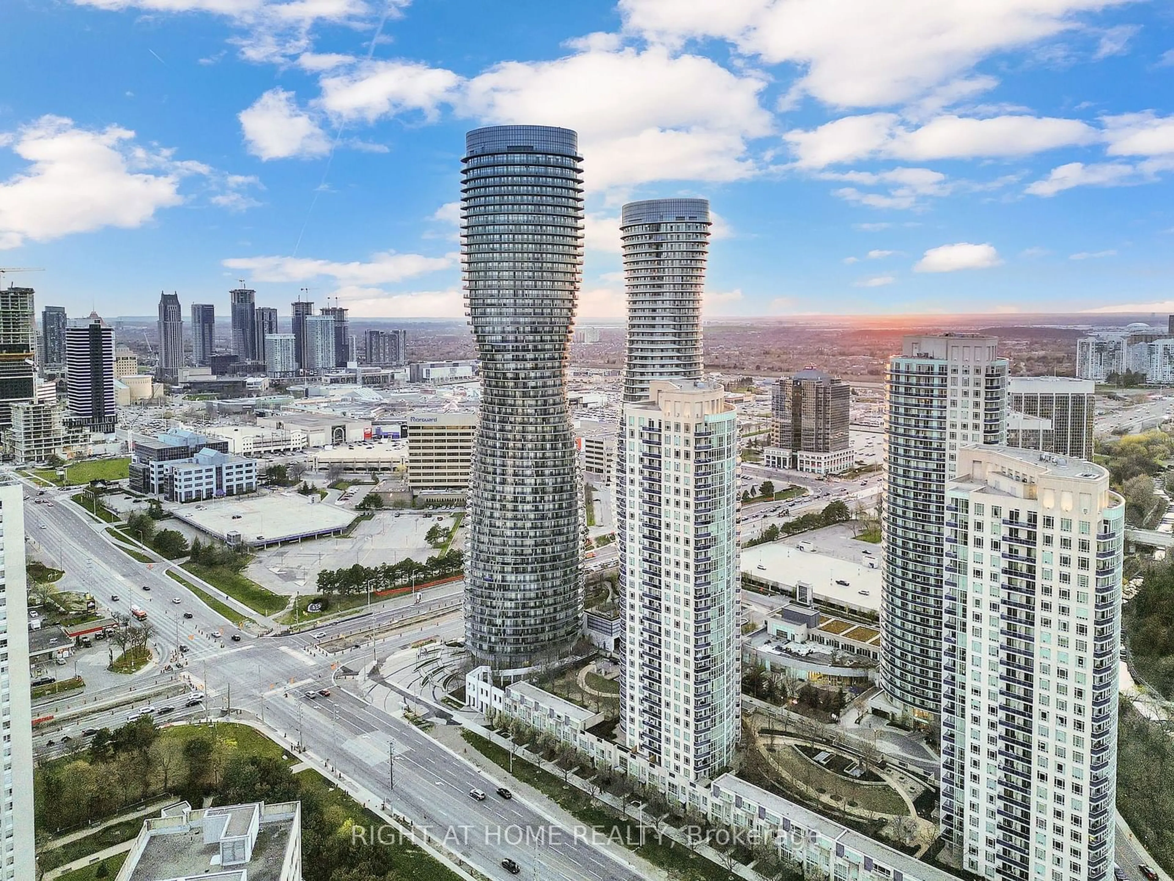 A pic from exterior of the house or condo, the view of city buildings for 60 Absolute Ave #3605, Mississauga Ontario L4Z 0A8