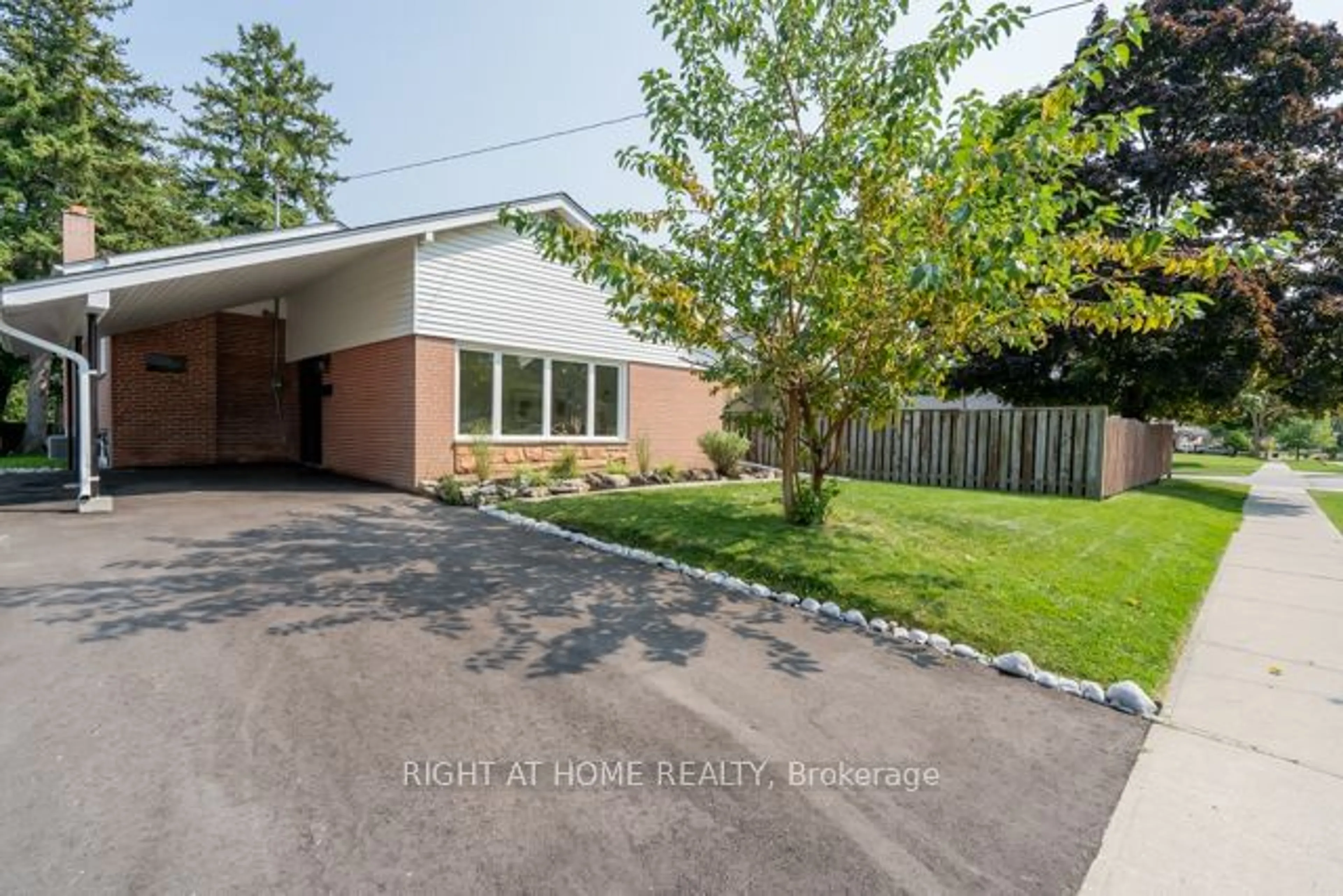 Frontside or backside of a home, the fenced backyard for 19 Gladsmore Cres, Toronto Ontario M9W 3Y8