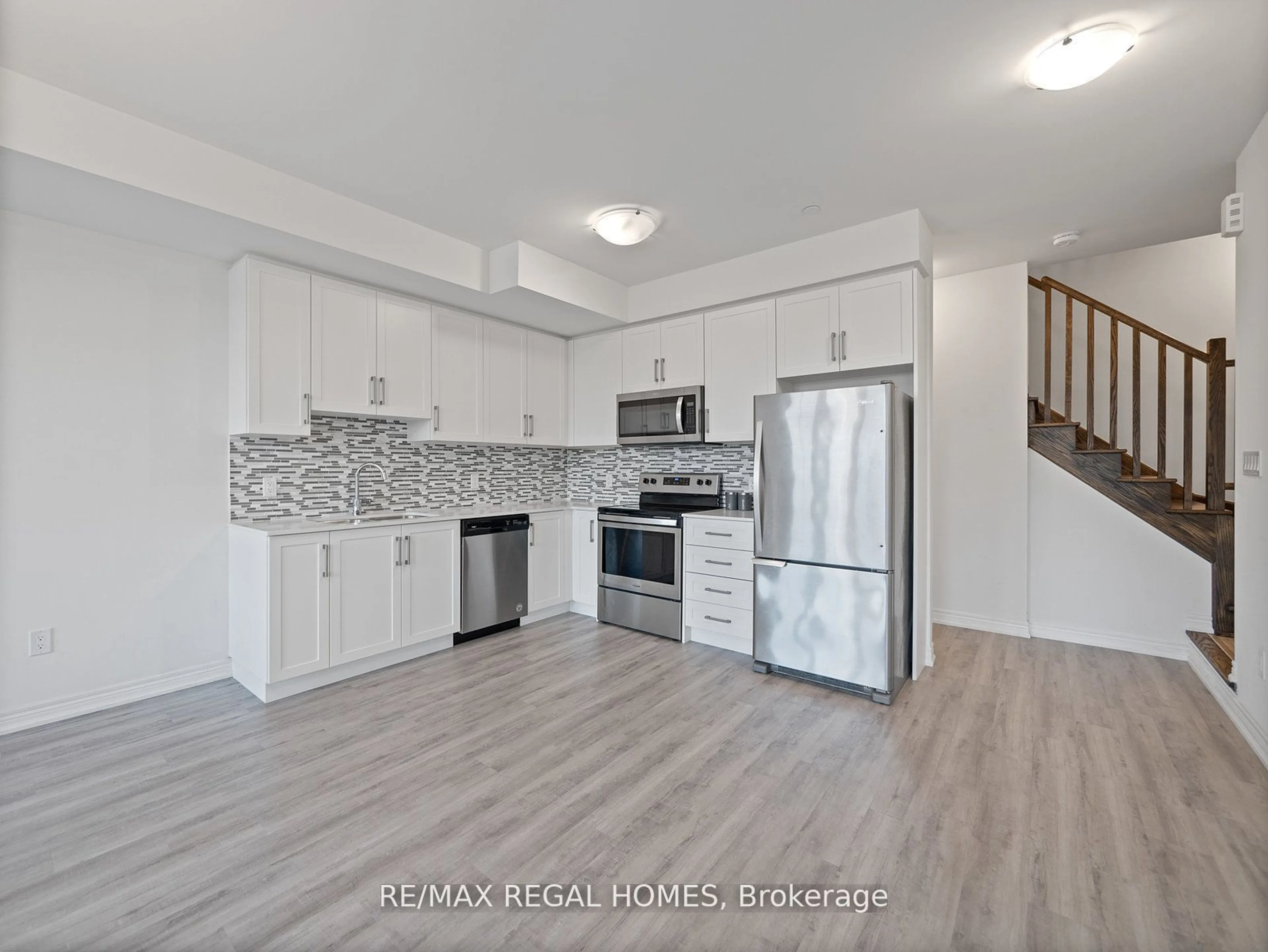 Open concept kitchen for 2205 Lillykin St #3, Oakville Ontario L6H 7H2