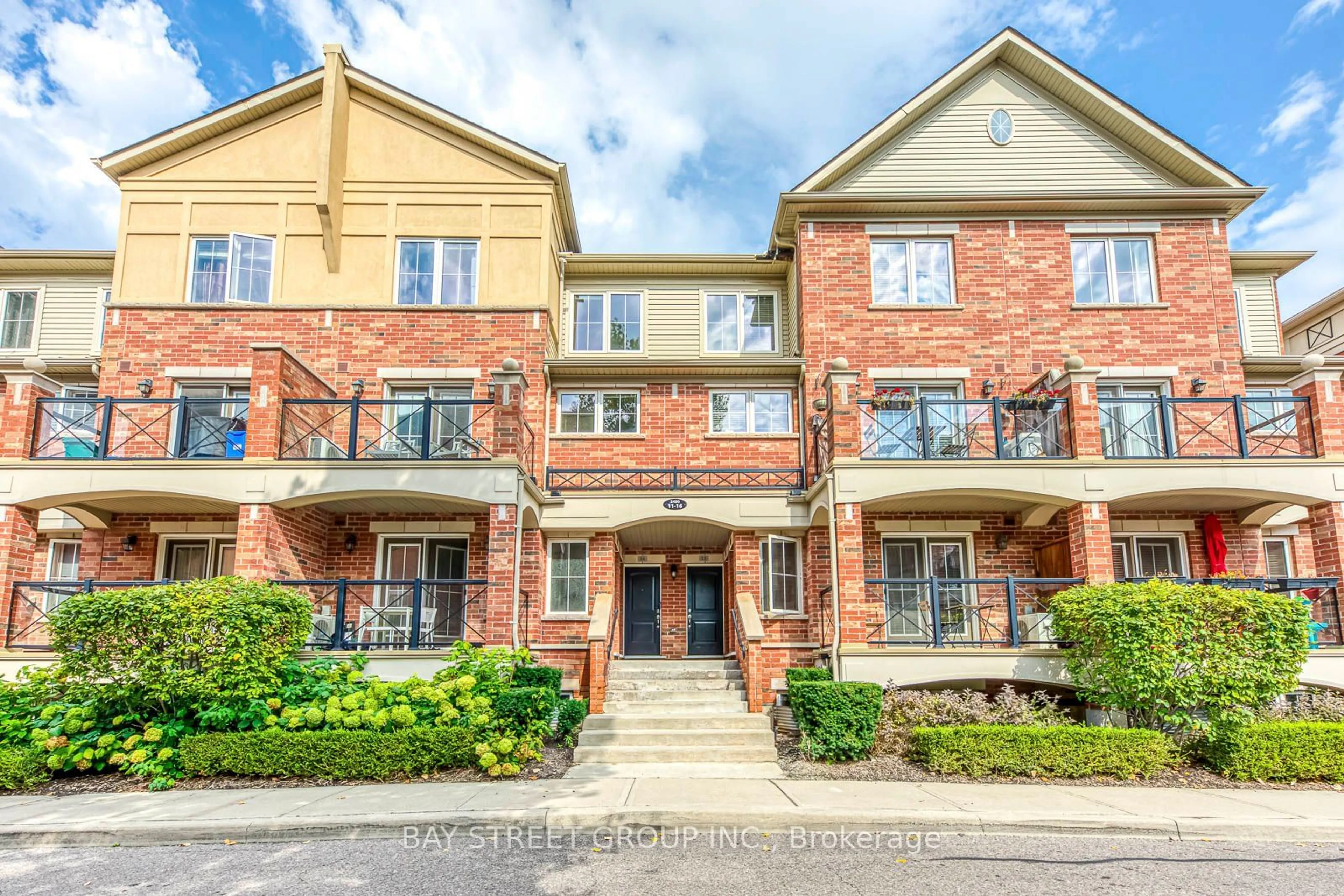 A pic from exterior of the house or condo, the street view for 2450 Post Rd #15, Oakville Ontario L6H 0J2