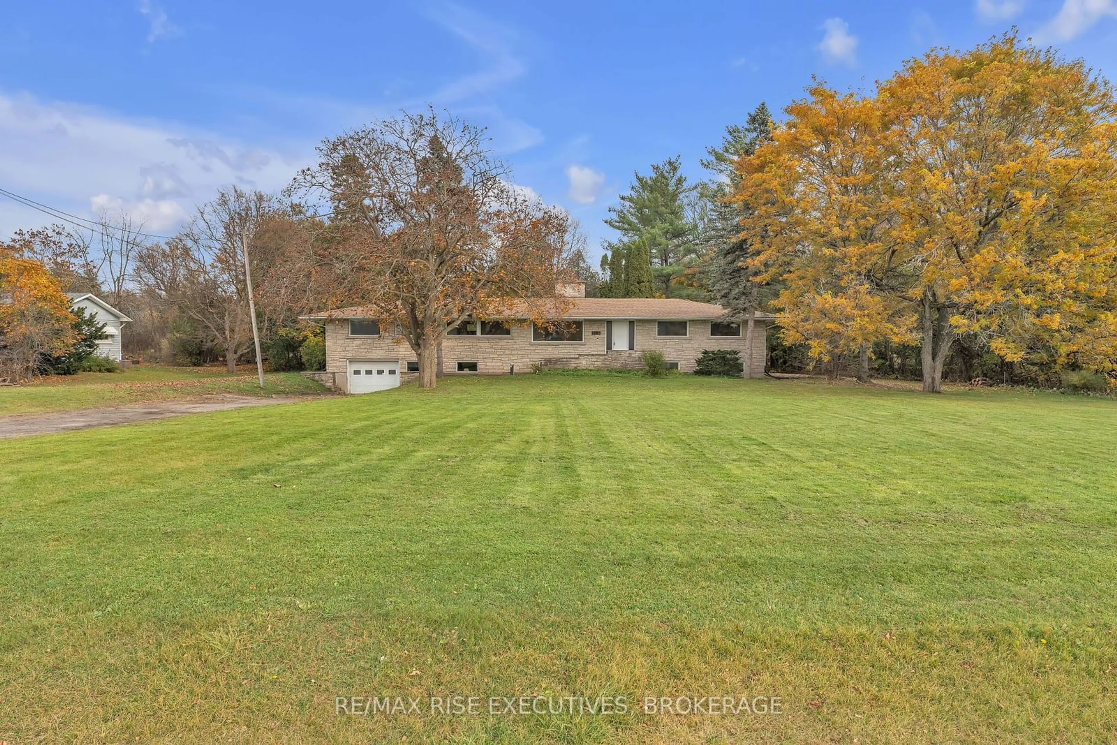 Frontside or backside of a home, the fenced backyard for 1802 Sydenham Rd, Kingston Ontario K7L 4V4