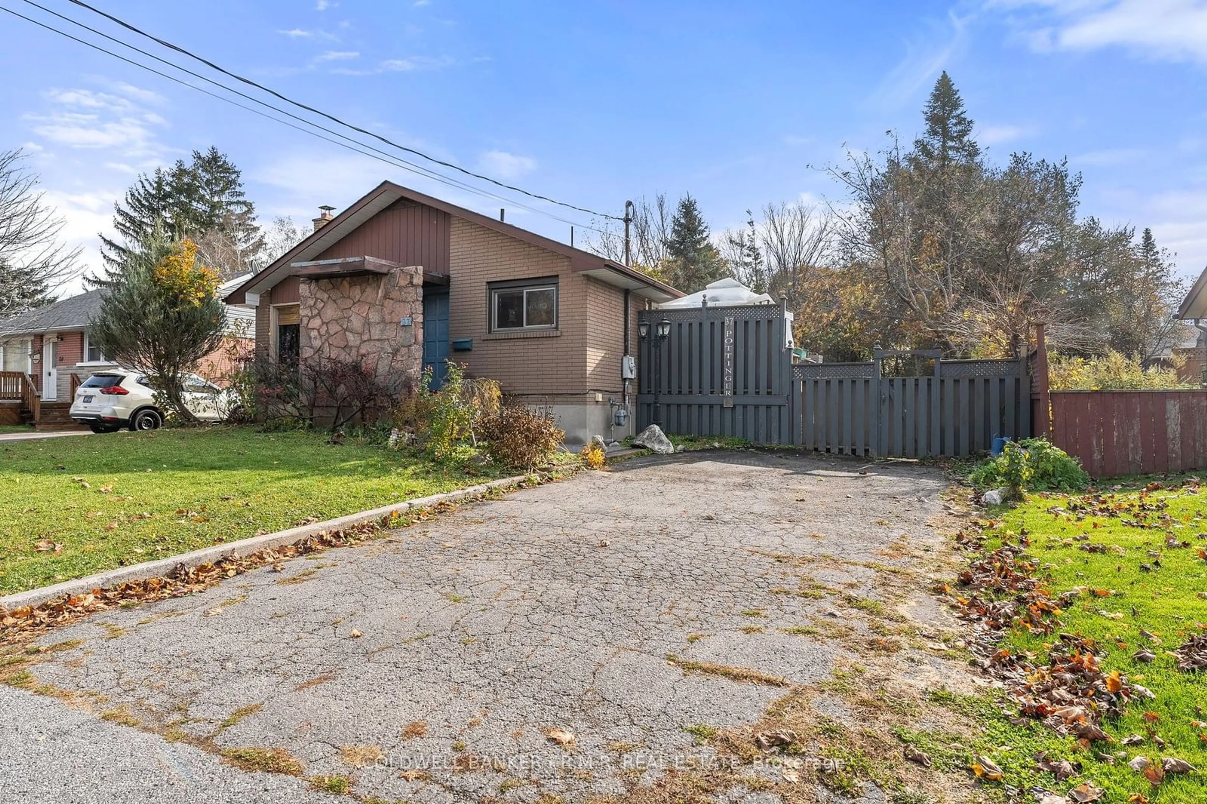 A pic from exterior of the house or condo, the fenced backyard for 37 Pottinger St, Kawartha Lakes Ontario K9V 3X6