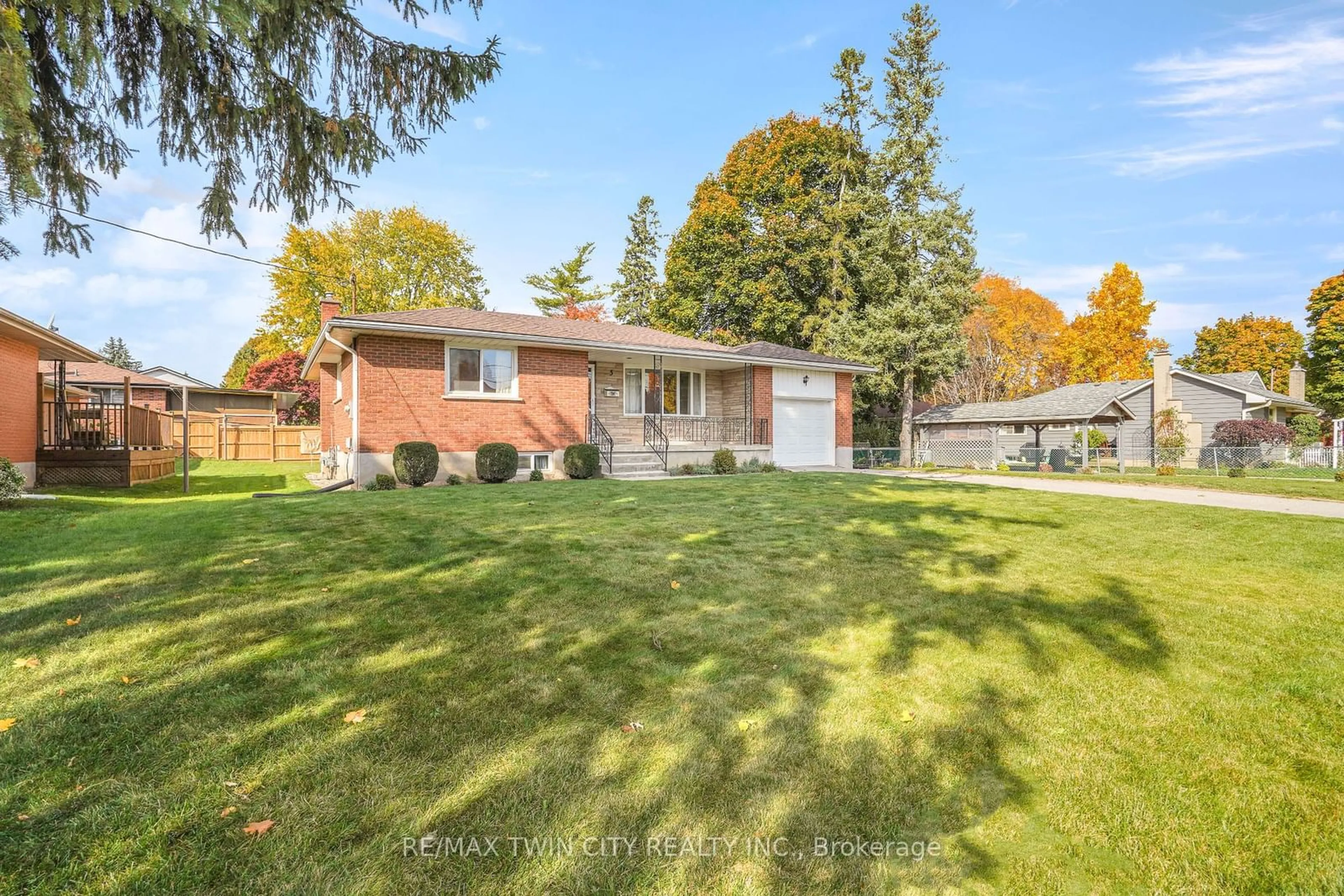 Frontside or backside of a home, the fenced backyard for 5 Allwood St, Brantford Ontario N3R 2T9