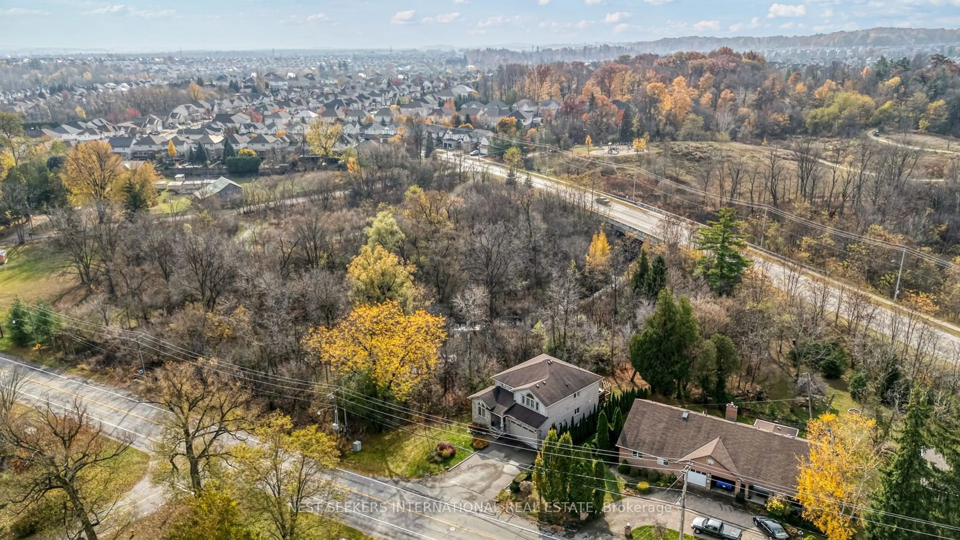 A pic from exterior of the house or condo, the street view for 967 Doon Village Rd, Kitchener Ontario N2P 1A1