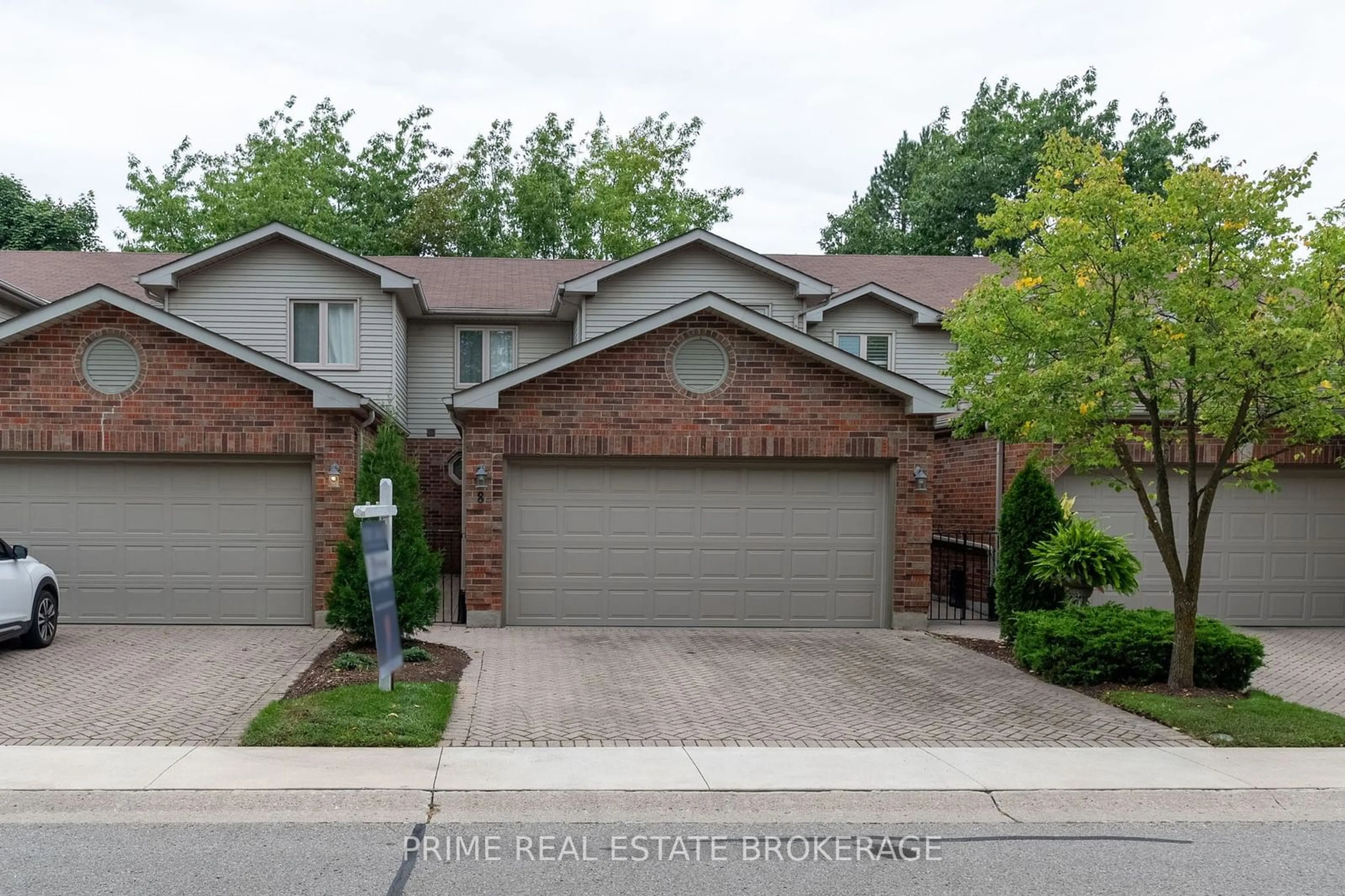 A pic from exterior of the house or condo, the street view for 70 Sunnyside Dr #8, London Ontario N5X 3W4