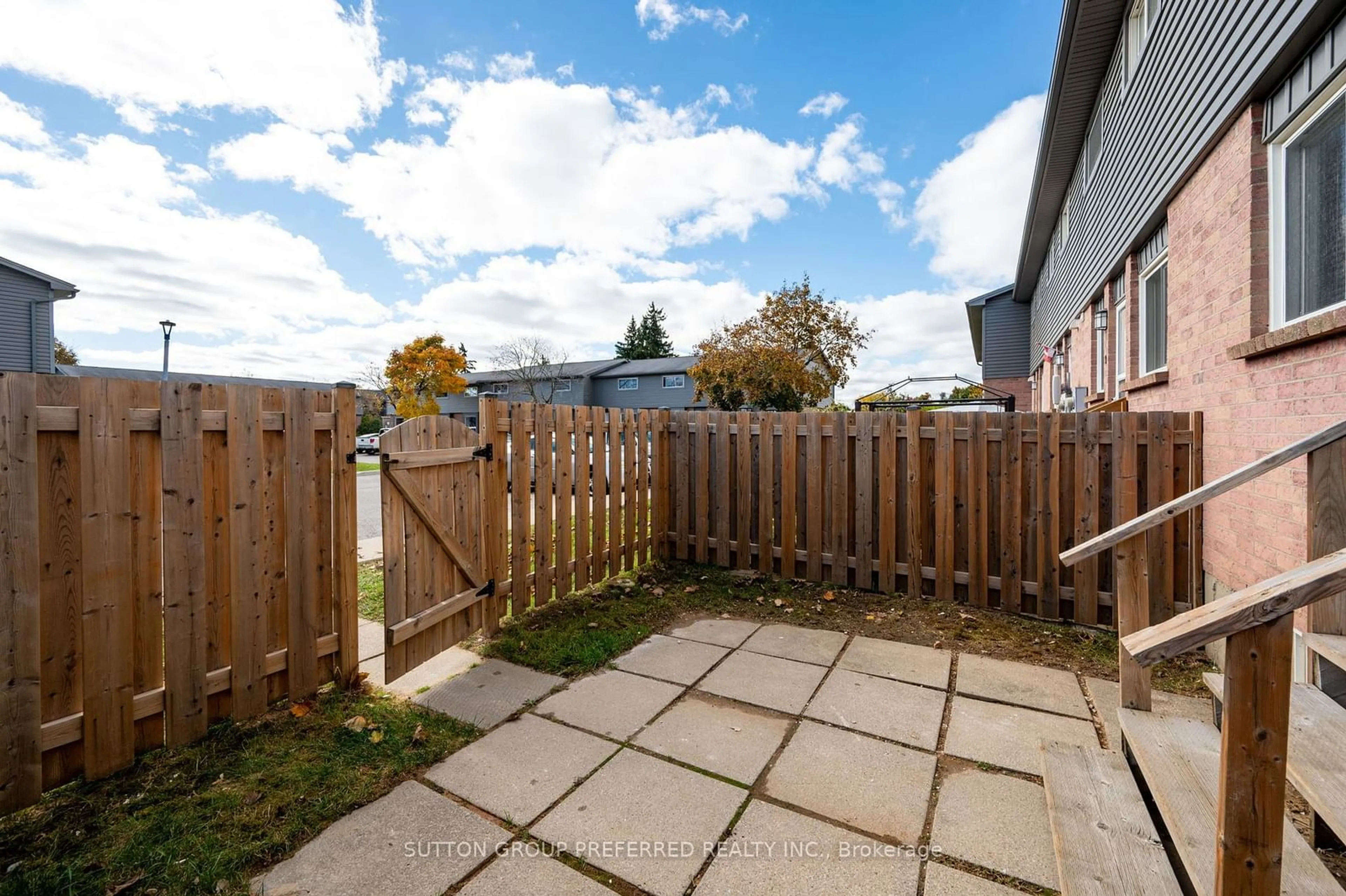 Patio, the fenced backyard for 1443 Huron St #8, London Ontario N5V 2E6